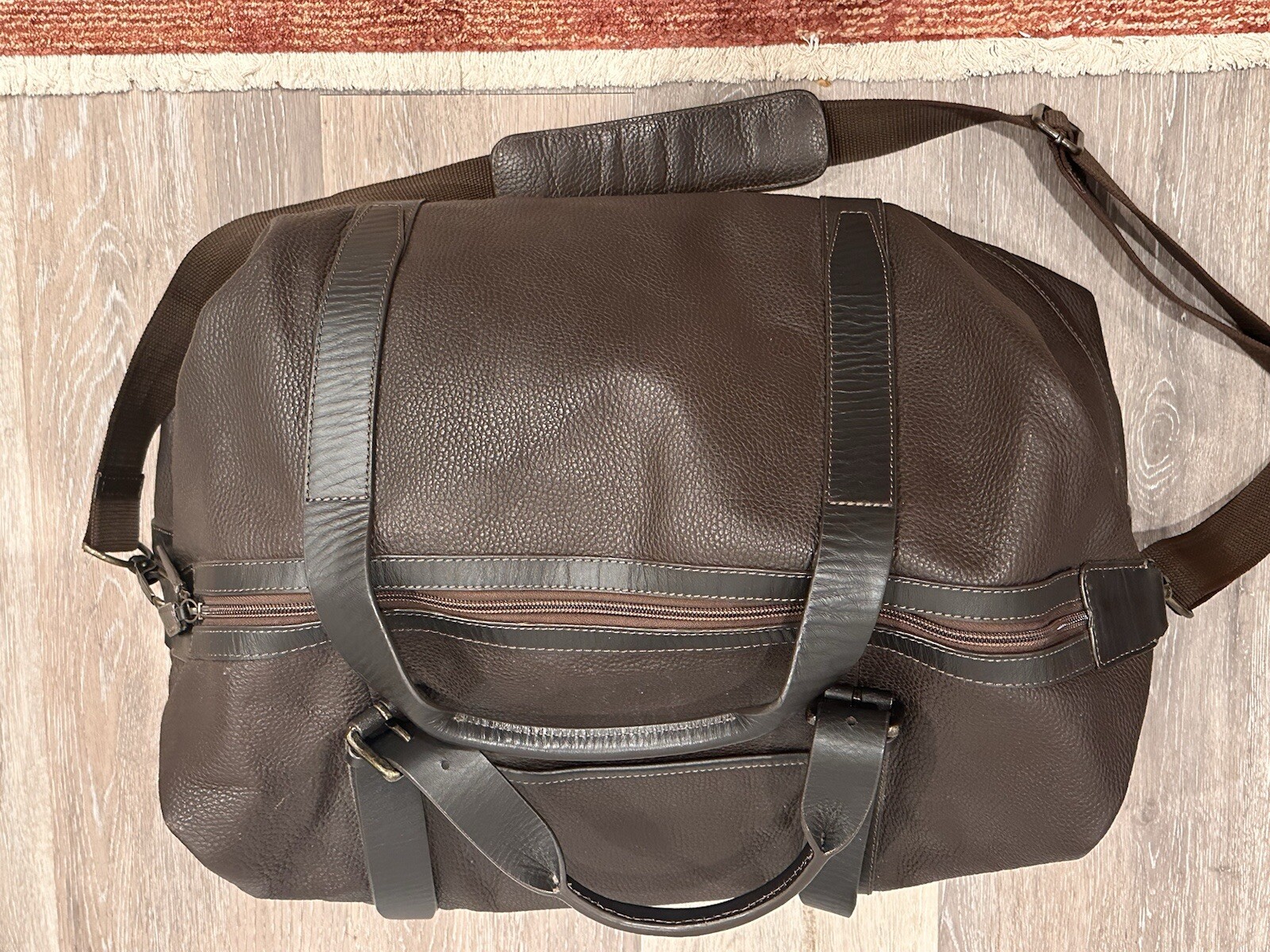 Brown Wilson’s Pebbled Leather Duffle Travel Bag Black Rivet Double Straps