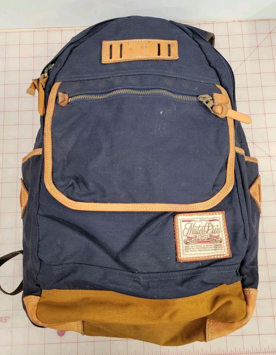Master-Piece Backpack – Made in Japan Navy & Tan Leather.