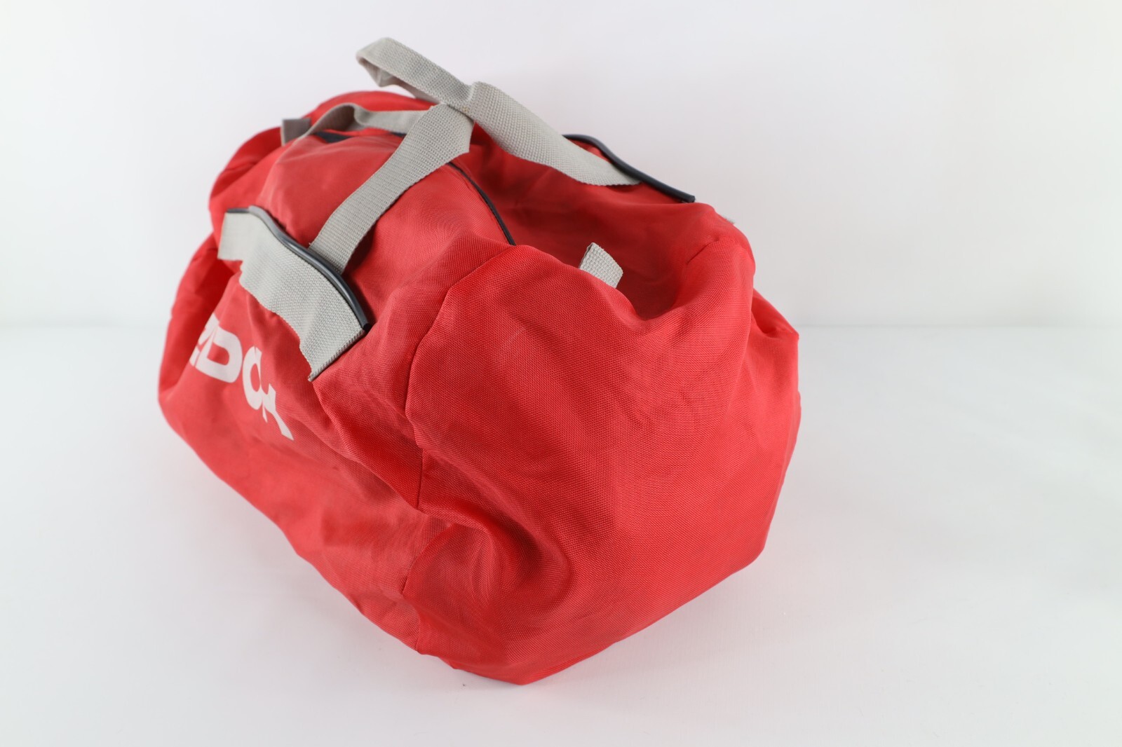 Vintage 90s Reebok Spell Out Big Logo Handled Duffel Bag Gym Bag Carry On Red