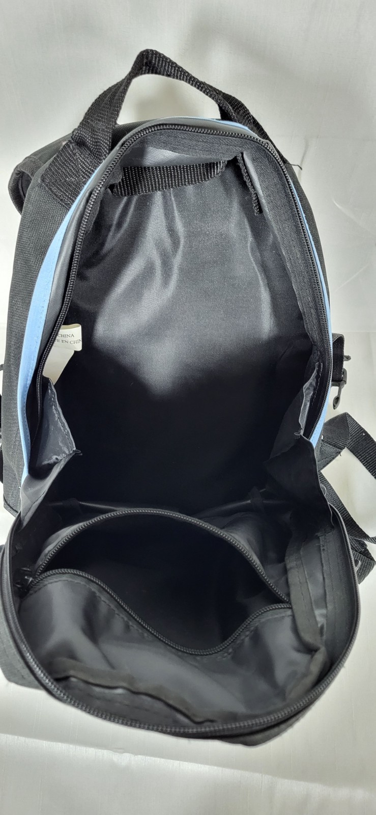 black and blue Reebok backpack