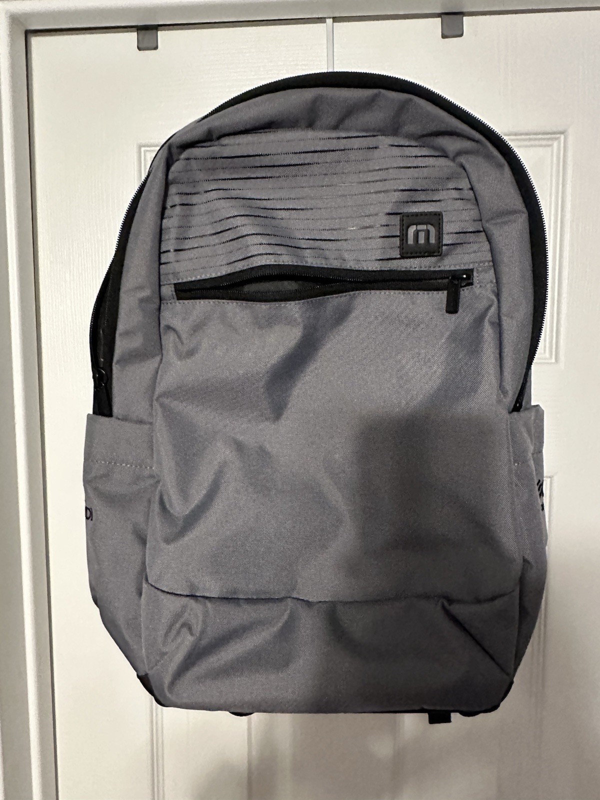 TravisMathew Duration Backpack in the graphite-gray colorway