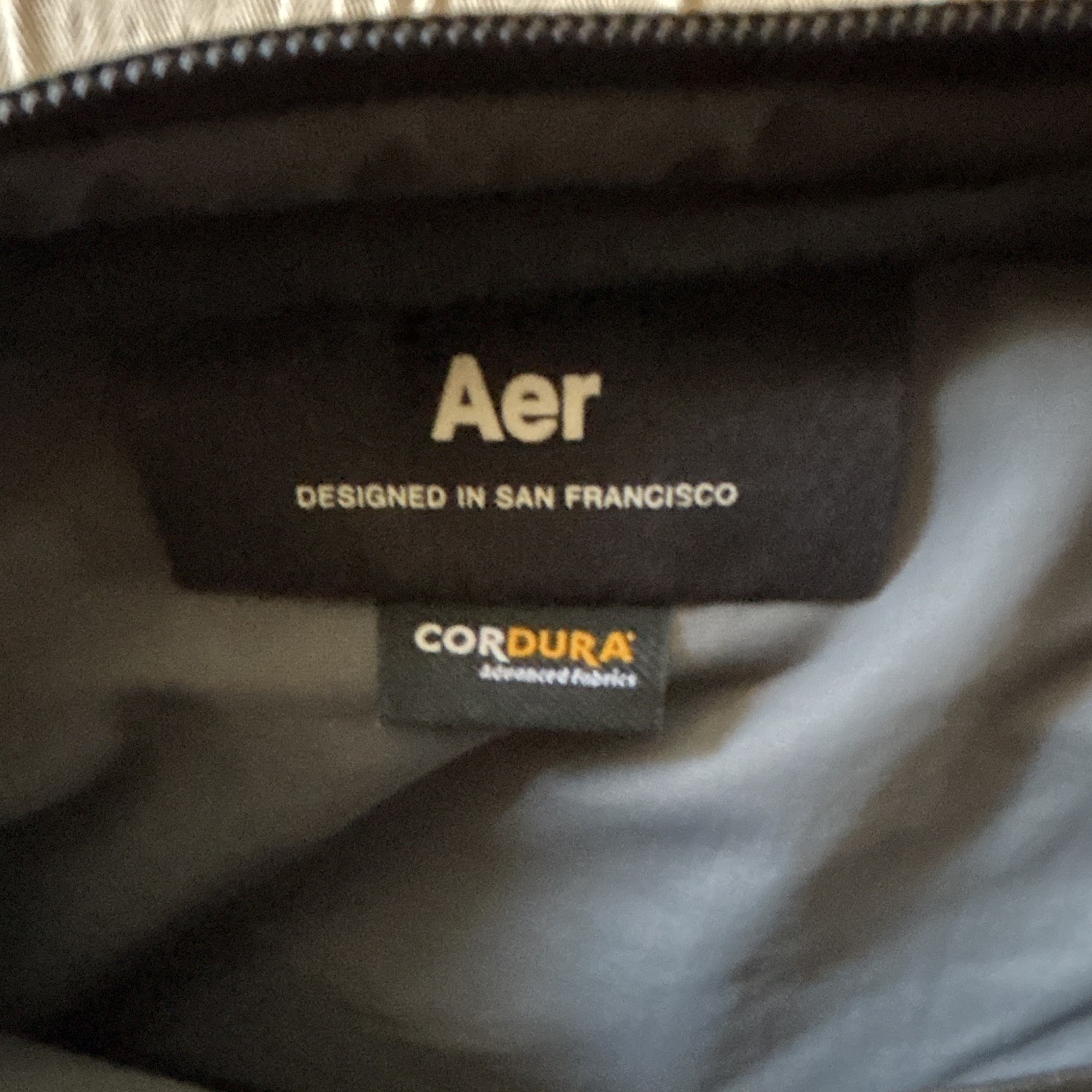 Aer Black Crossbody Sling Bag, Zip Closure, Adjustable Strap, Pockets