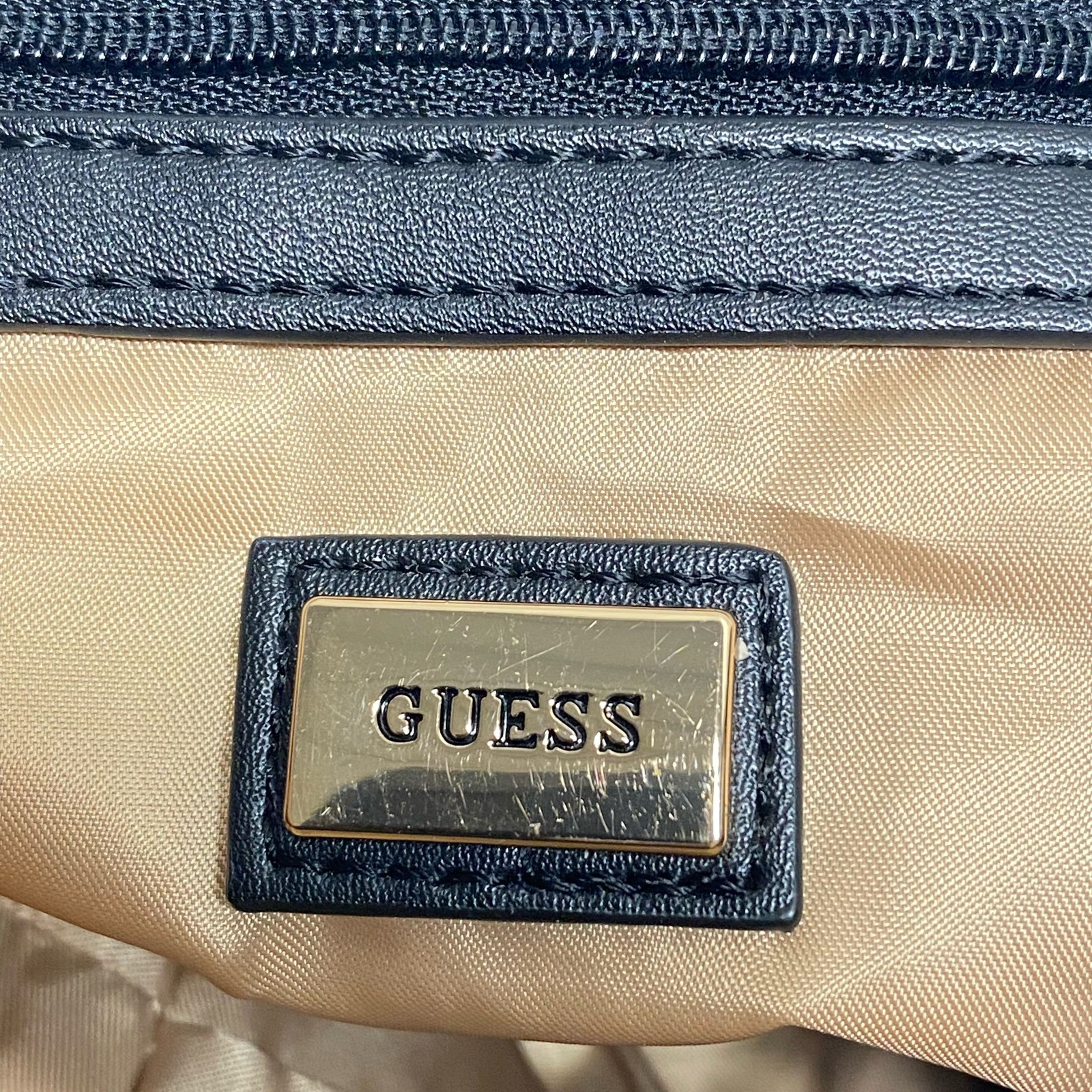 Guess Beige Cream Monogram Logo Small Flap Drawstring Backpack Gold Hardware