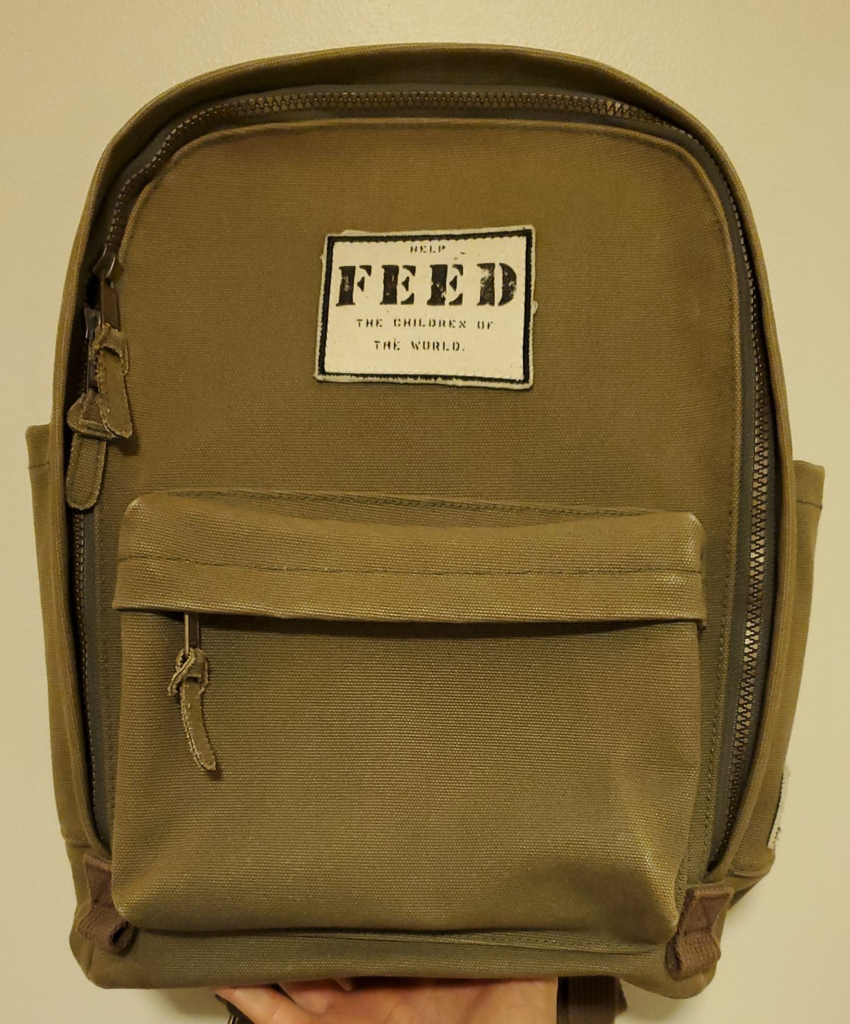 FEED Projects Green Backpack. Used Great Condition. See Photos