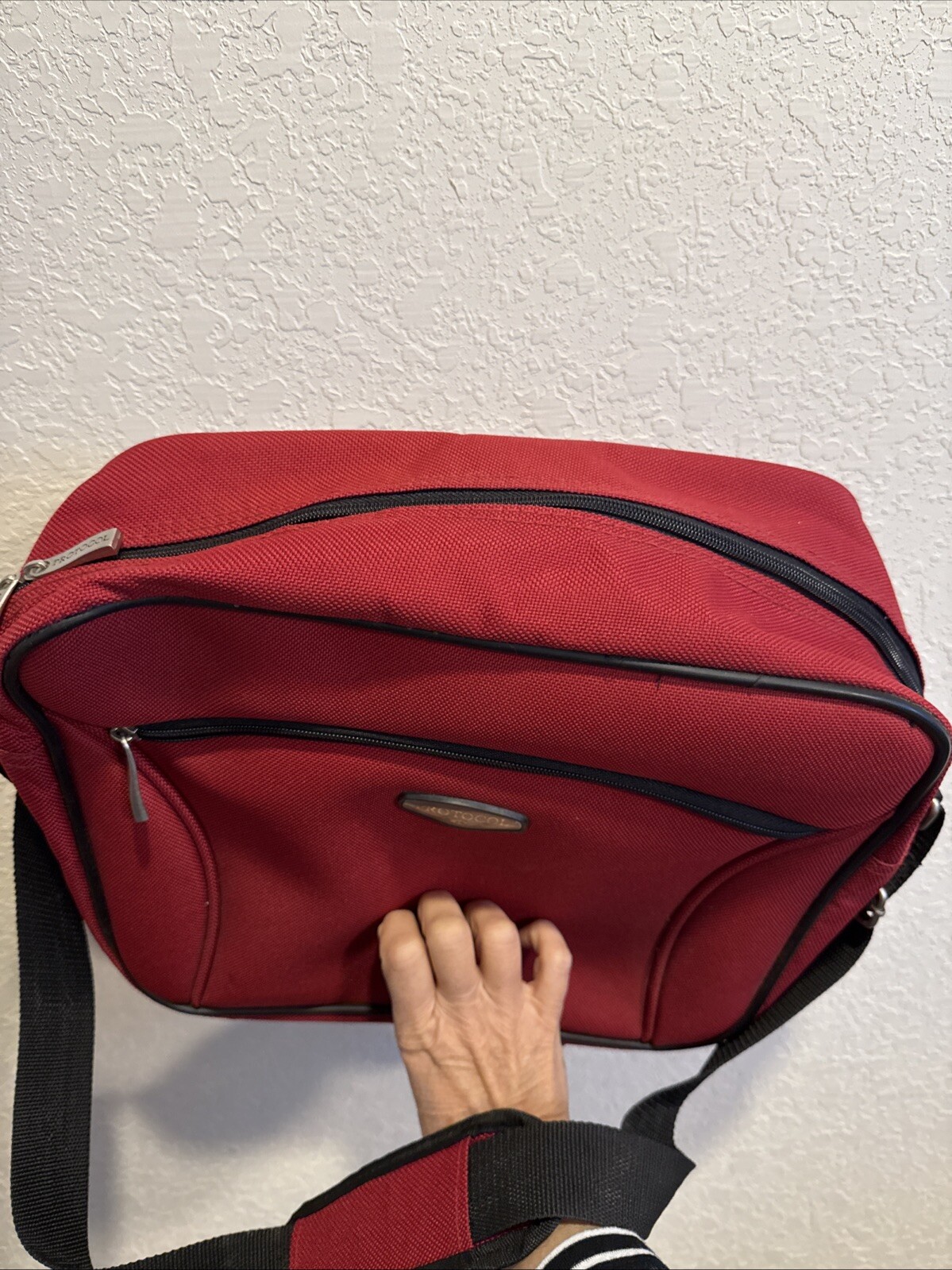 Protocol Messenger Bag Red 10in x 12in x 6in water resistant crossbody strap