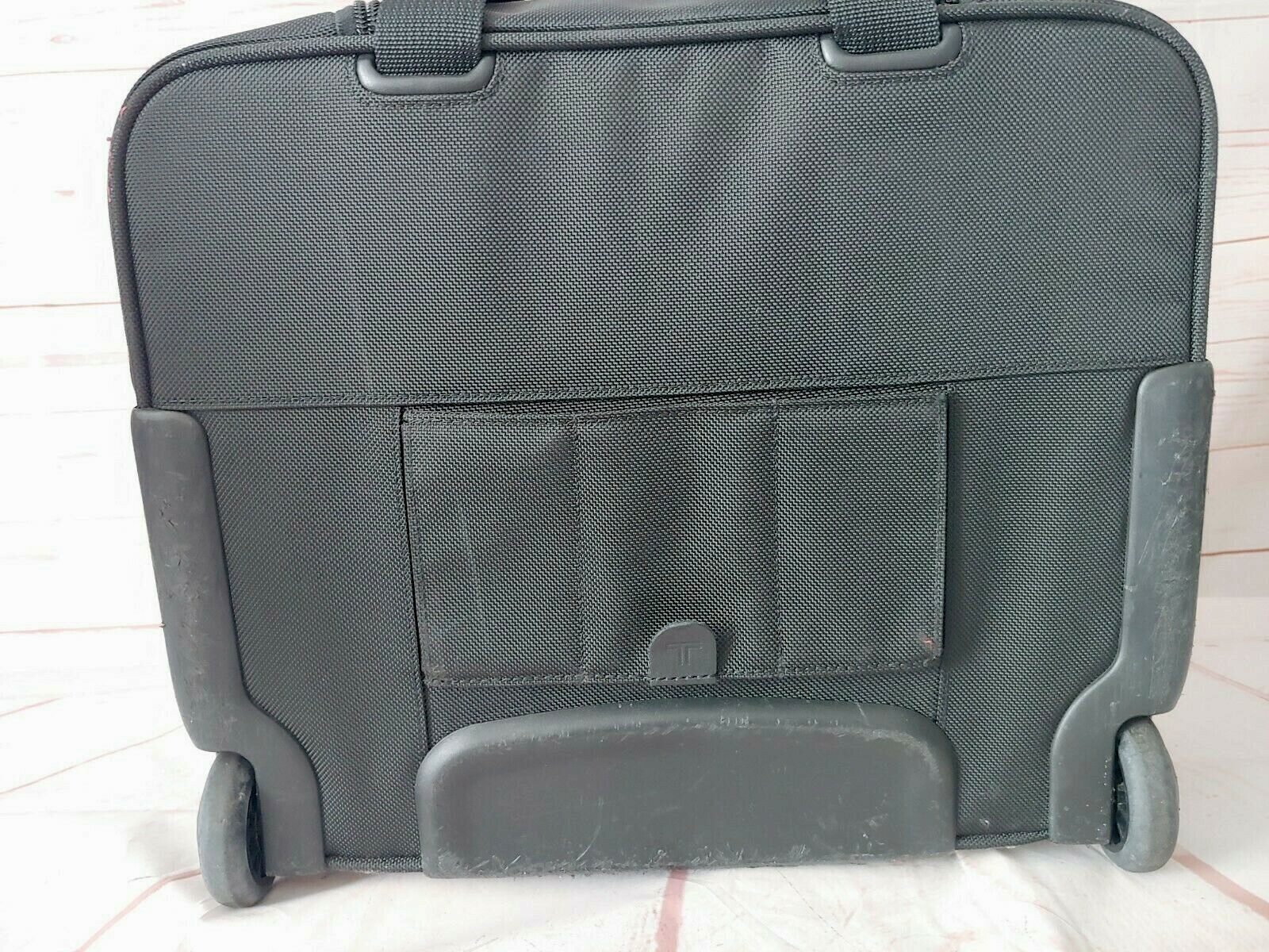 TUMI Black Wheeled Rolling Briefcase/Carry on Bag 15X13X6 Inches