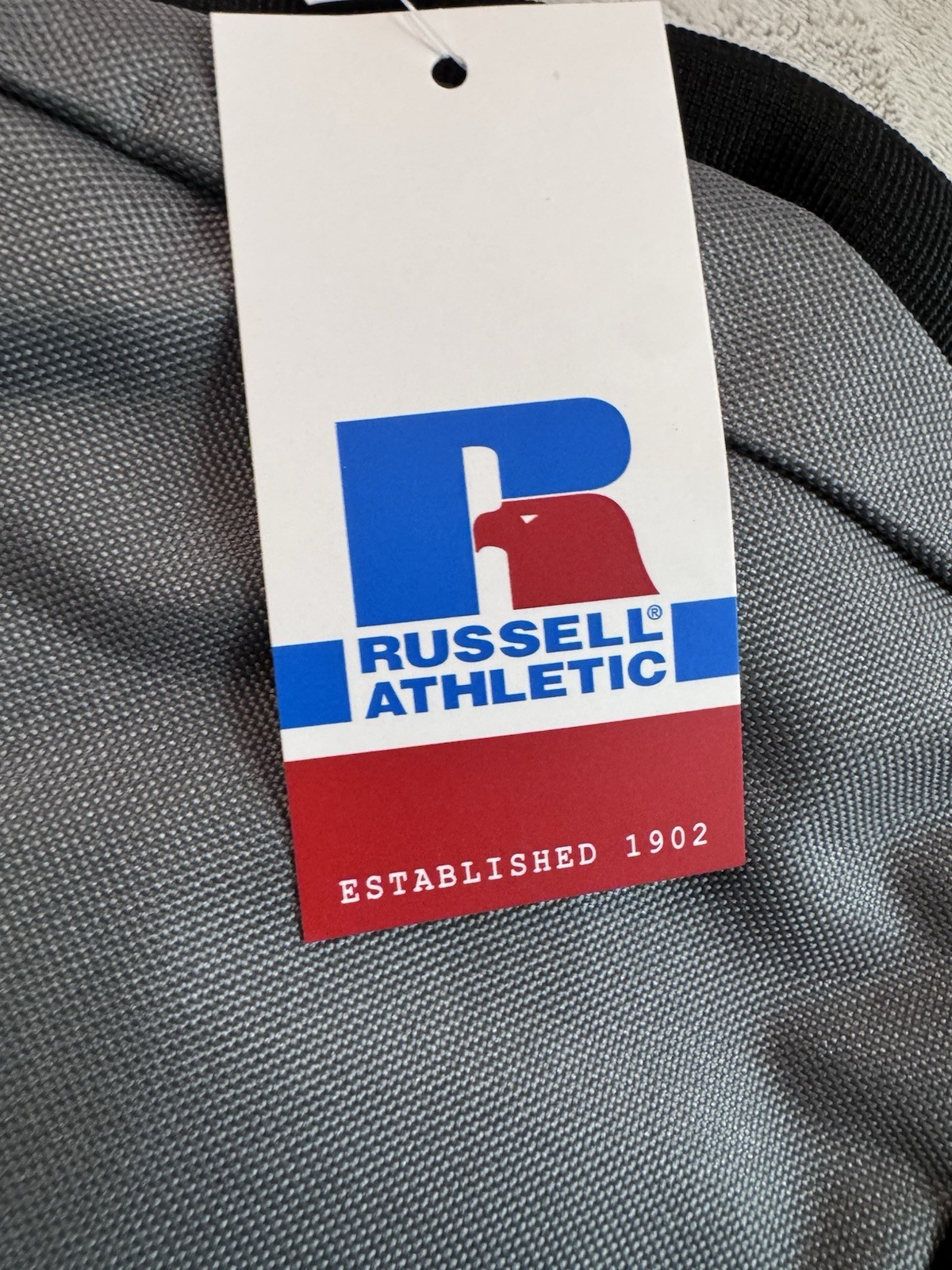 Russell Athletic Grey Backpack With Adjustable Straps & Side Pockets. Brand New