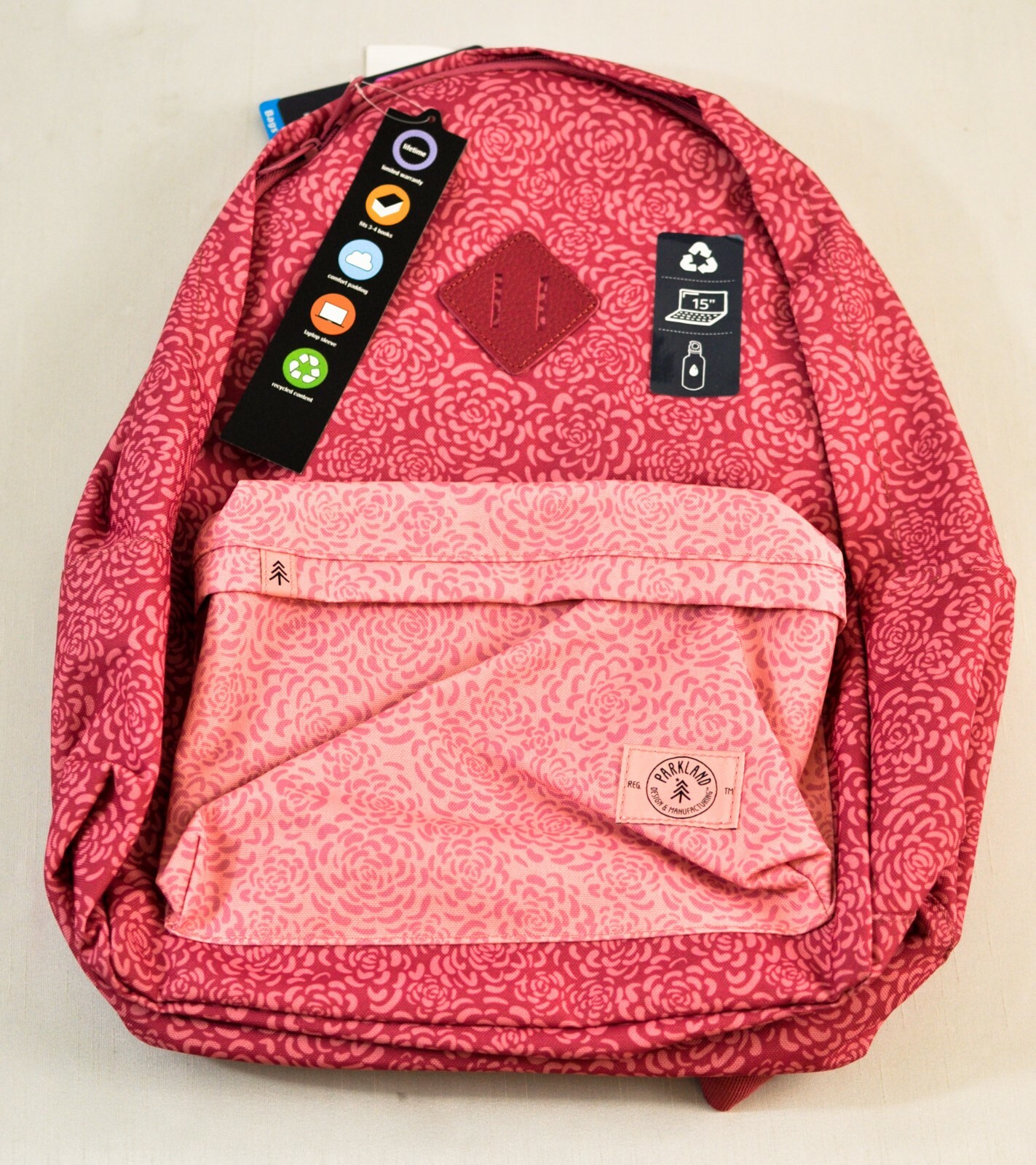 Palo backpack numerous pockets cushion straps laptop sleeve pink floral