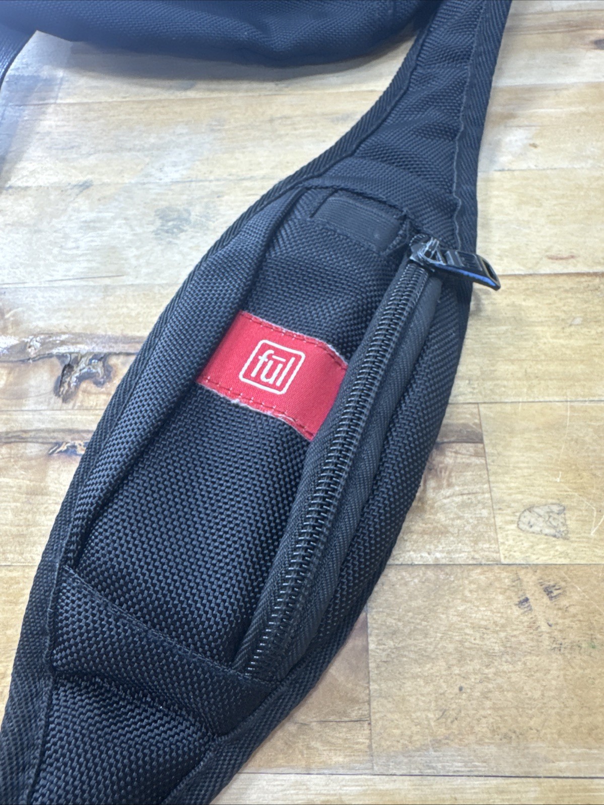 FUL One Shoulder Sling Backpack/Bag with adjustable strap in Black
