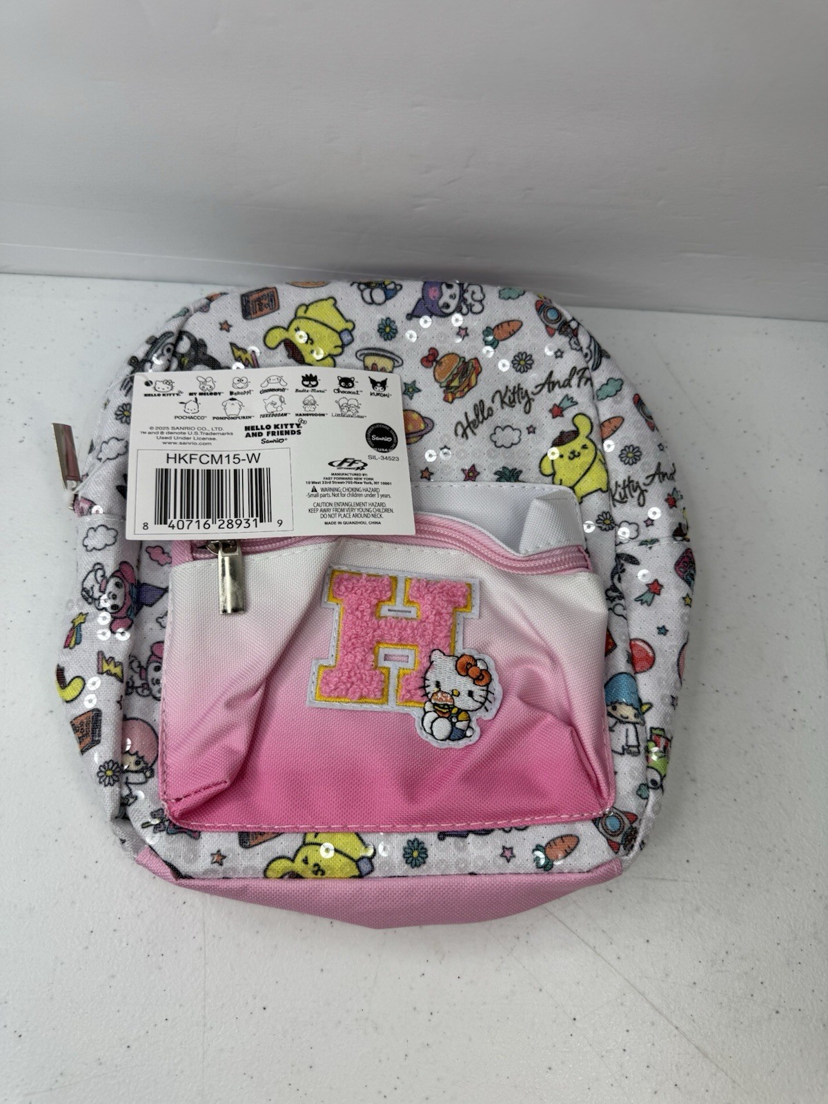 back pack made for carrying on your back or caring as a purse has reflective par
