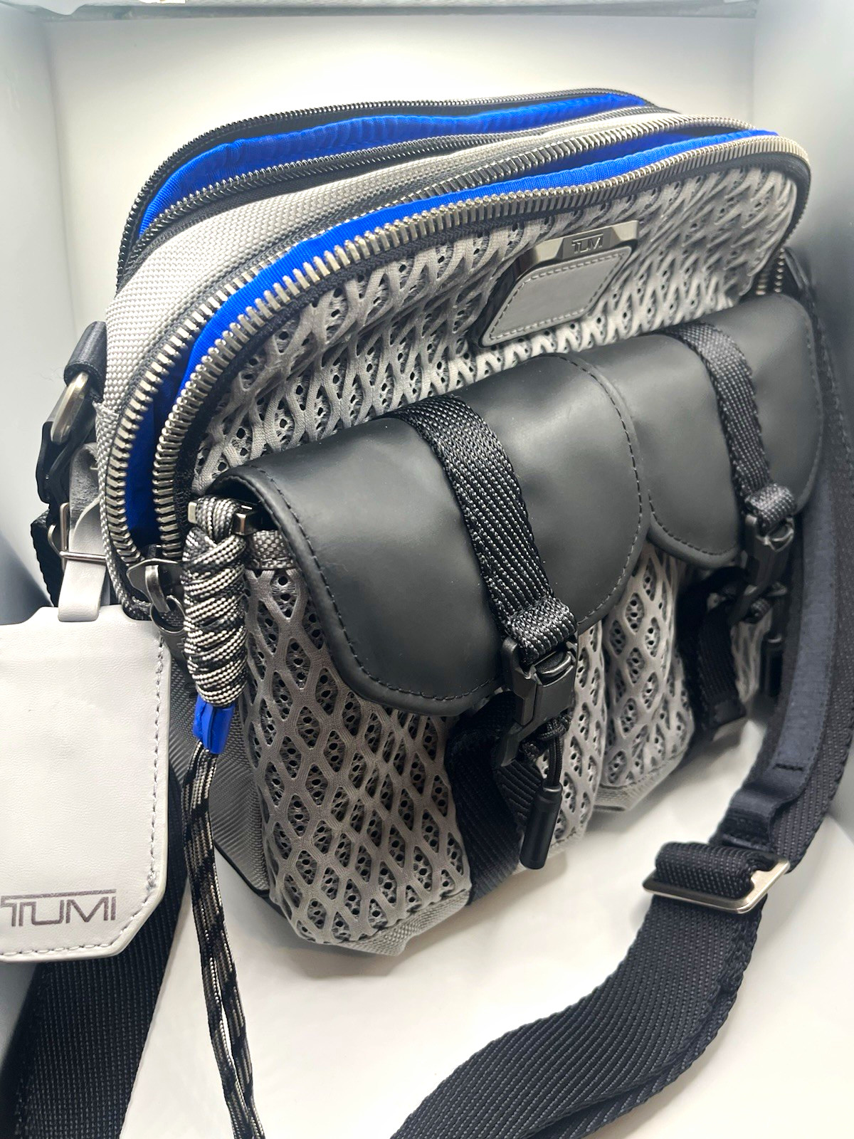 TUMI Crossbody Bag Gray/Black Mesh Blue Lining Adjustable Strap Pockets