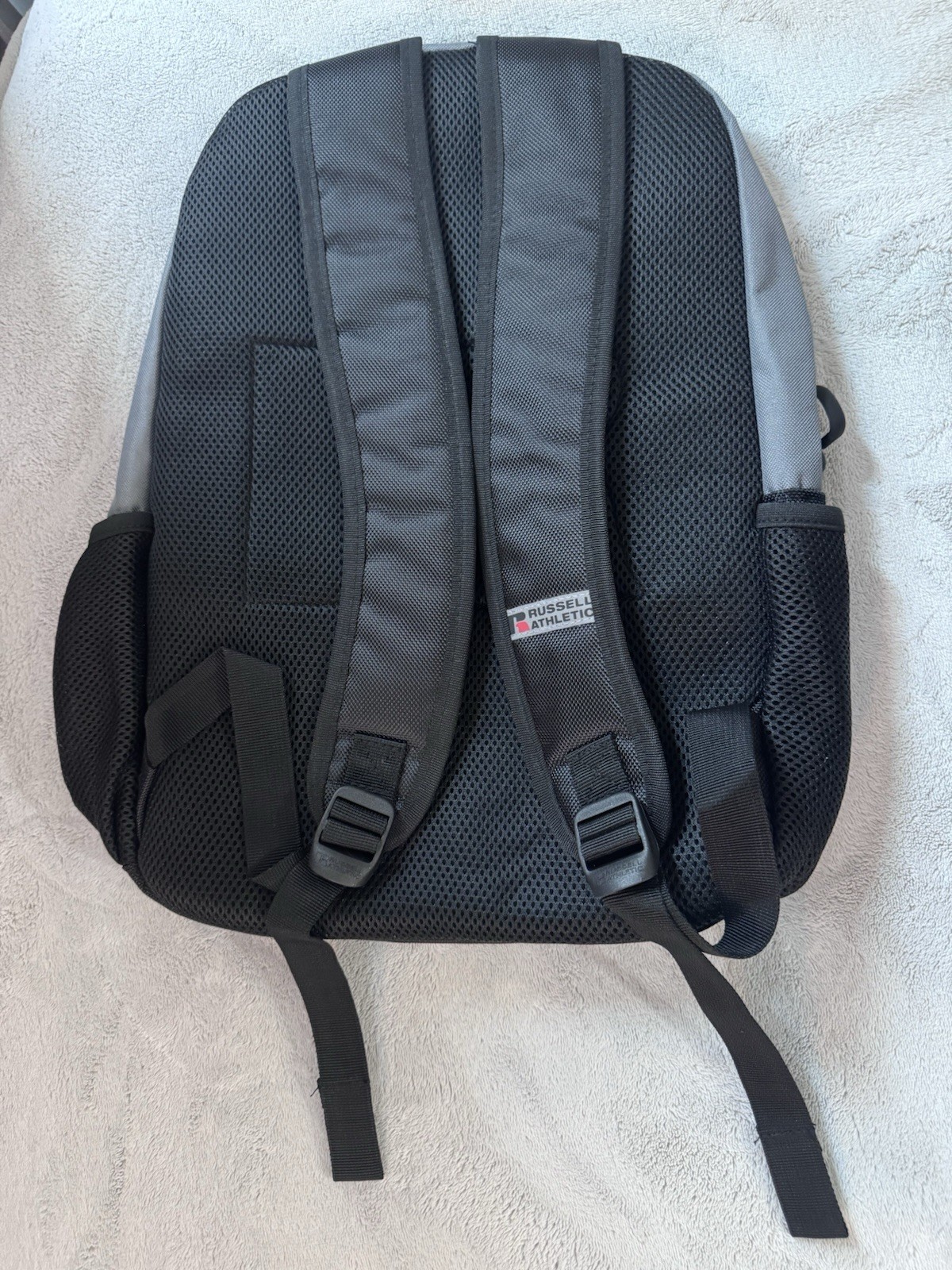 Russell Athletic Grey Backpack With Adjustable Straps & Side Pockets. Brand New