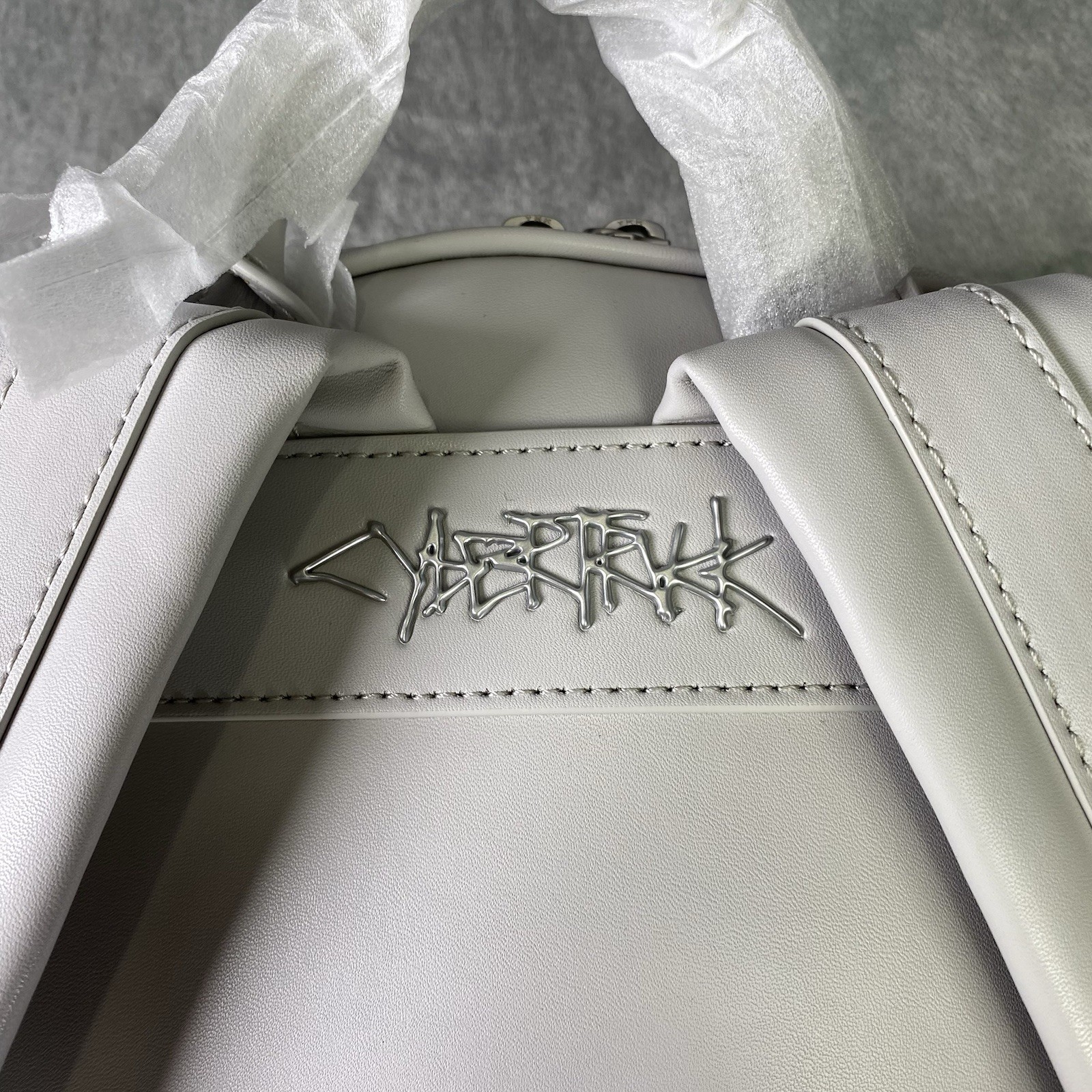 Tesla Cybertruck Elevate Backpack Grey Vegan Leather Tesla Store w/ Satin Cover