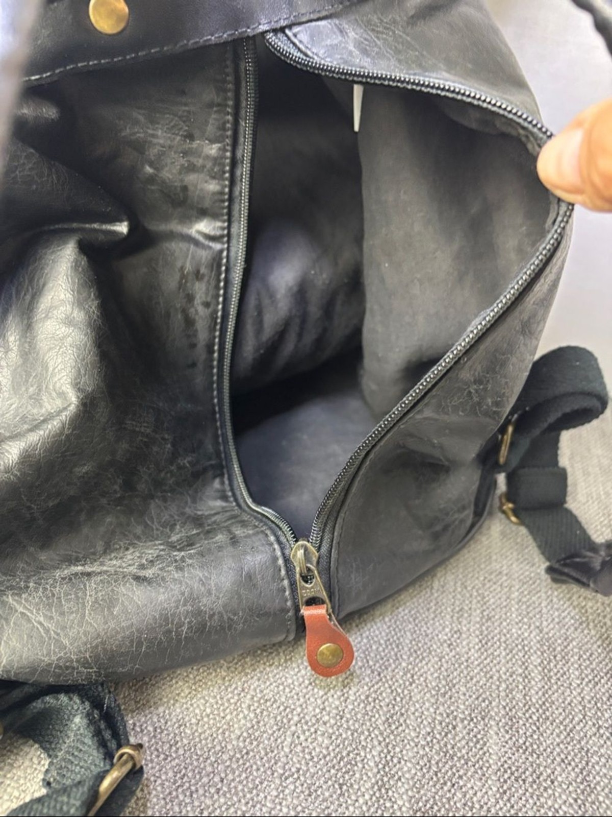 Tandem Black Leather Drawstring Backpack with Buckled Flap Cascade Falls