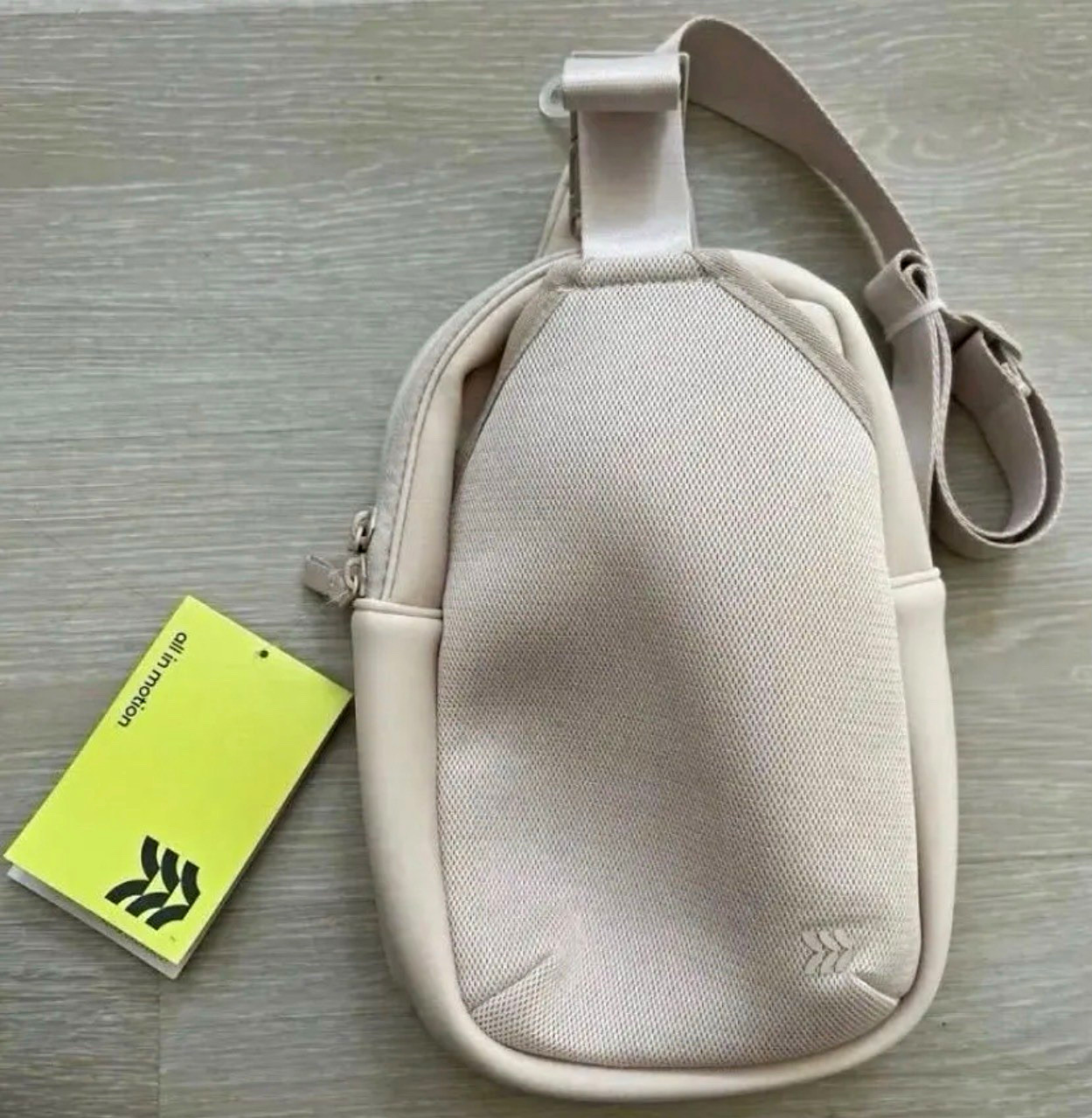 All in Motion Beige Crossbody Sling Bag Zip Closure Adjustable Strap Travel