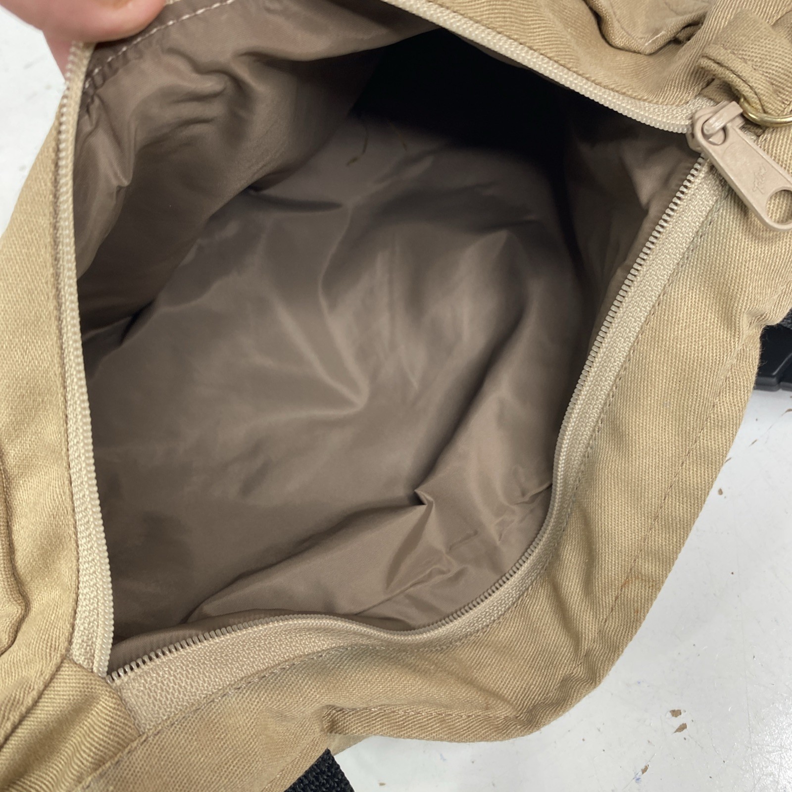 Orvis hanging accessory bag with plastic buckles insulated hand warmer pockets