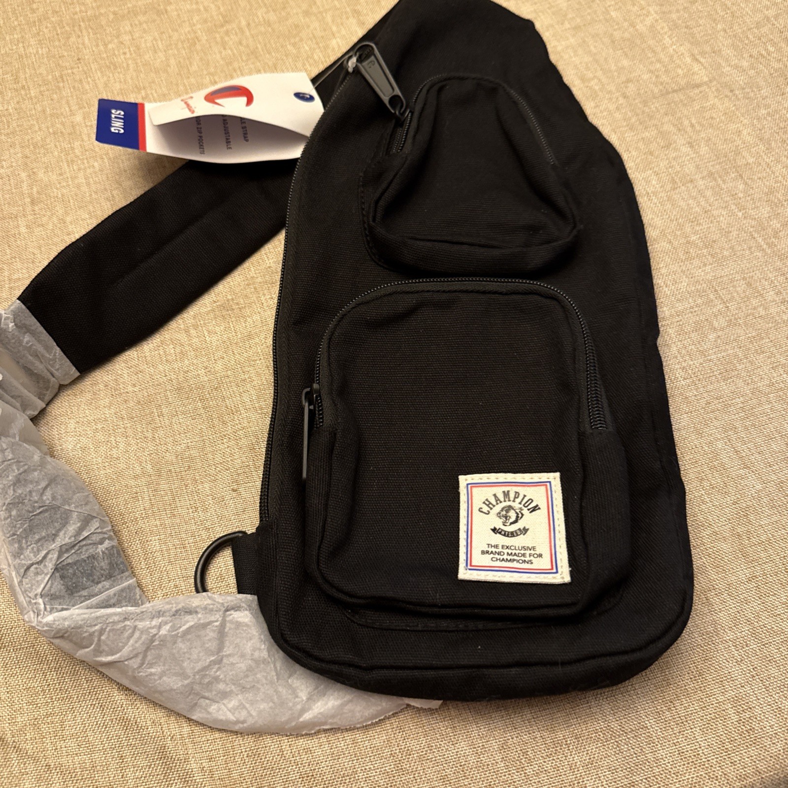 Champion Sling Bag Black Padded Adjustable Strap Exterior Zip Pockets