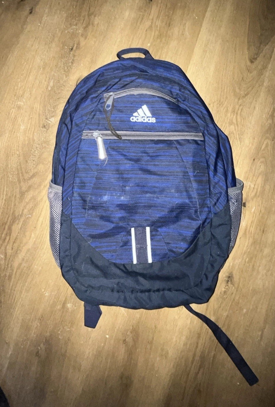 Adidas Blue Backpack with Vertical Black Stripes and Grey and Black Accents Used