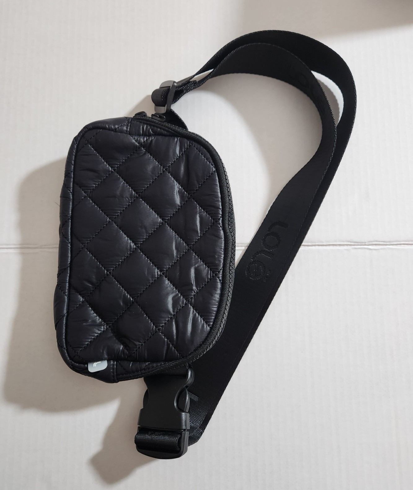 Lolë Black Quilted Small Crossbody Sling Bag Zip Closure, Adjustable Strap