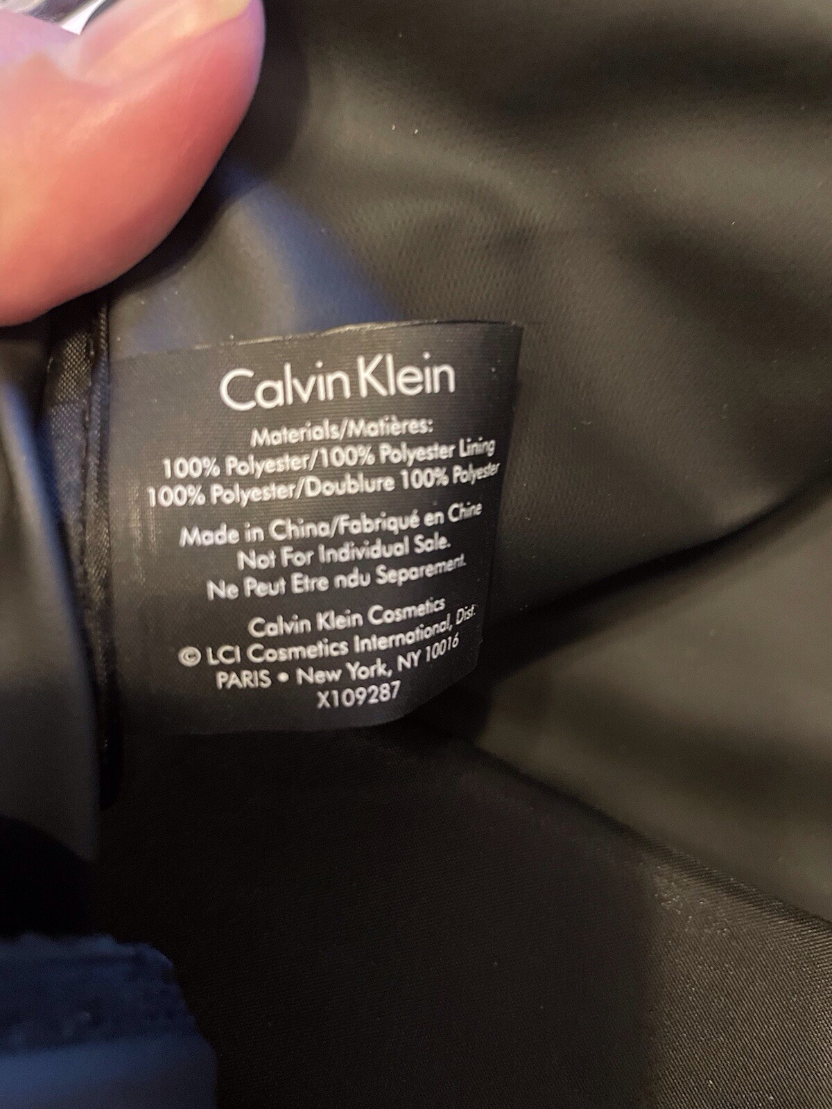 Calvin Klein 100% Polyester travel duffle bag black, shoulder strap, And Handles