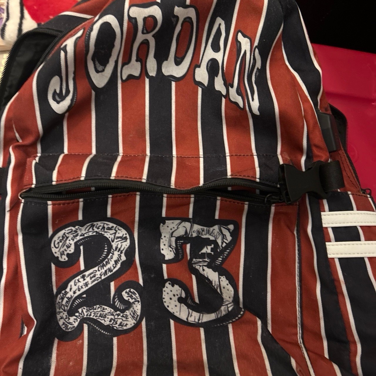 Striped Backpack Zip & Buckle Closure, Adjustable Strap, Pockets Red Black