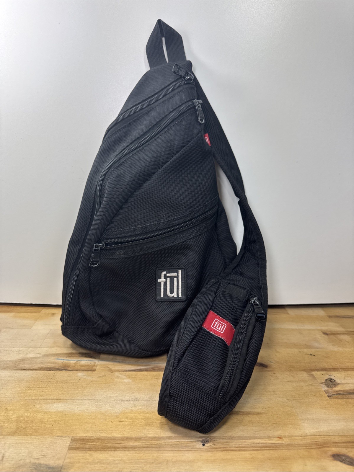 FUL One Shoulder Sling Backpack/Bag with adjustable strap in Black