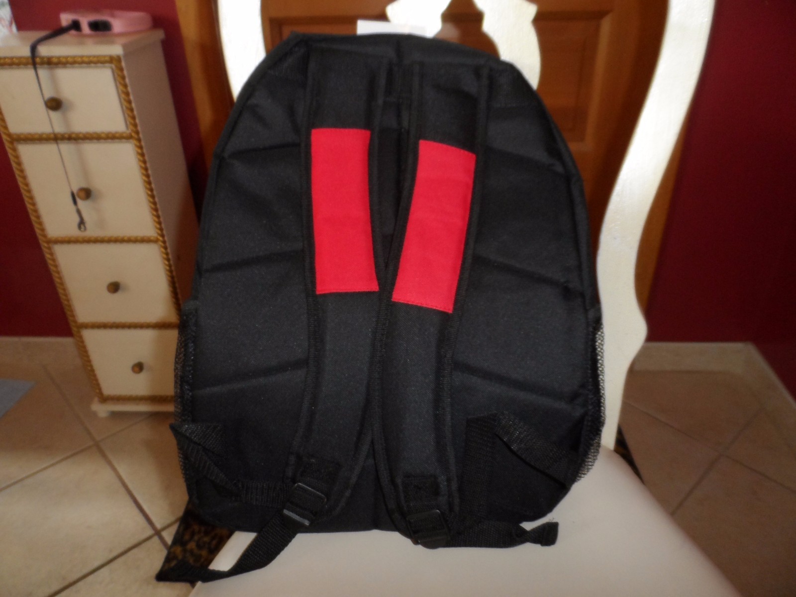 red, gray and black chamo print backpack from Prosport