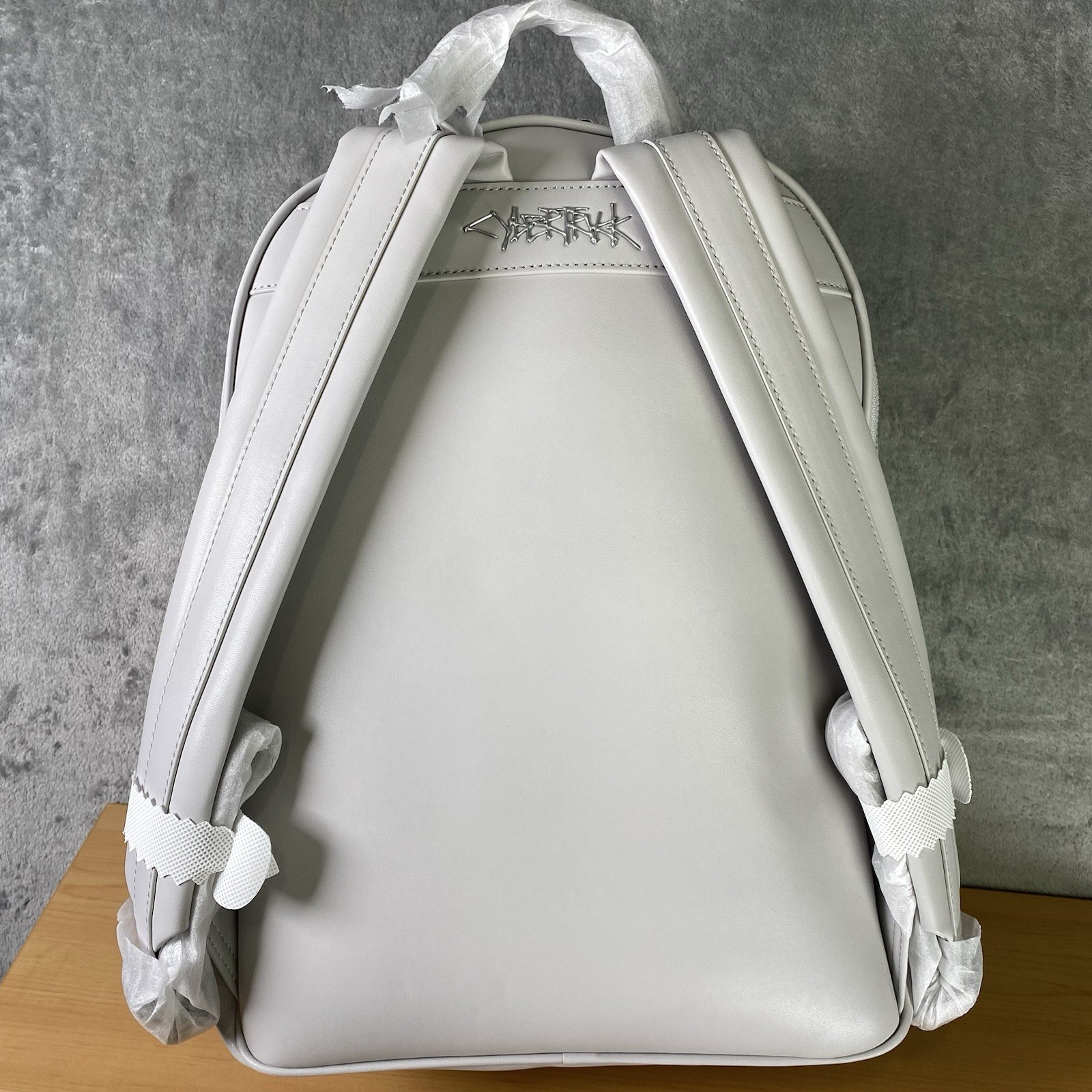 Tesla Cybertruck Elevate Backpack Grey Vegan Leather Tesla Store w/ Satin Cover
