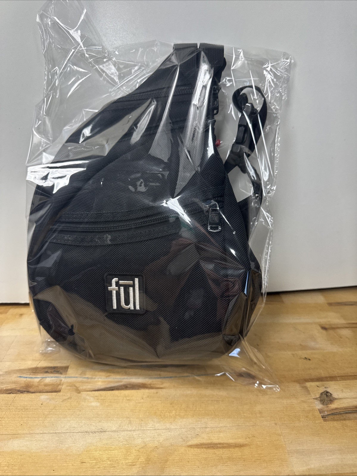 FUL One Shoulder Sling Backpack/Bag with adjustable strap in Black