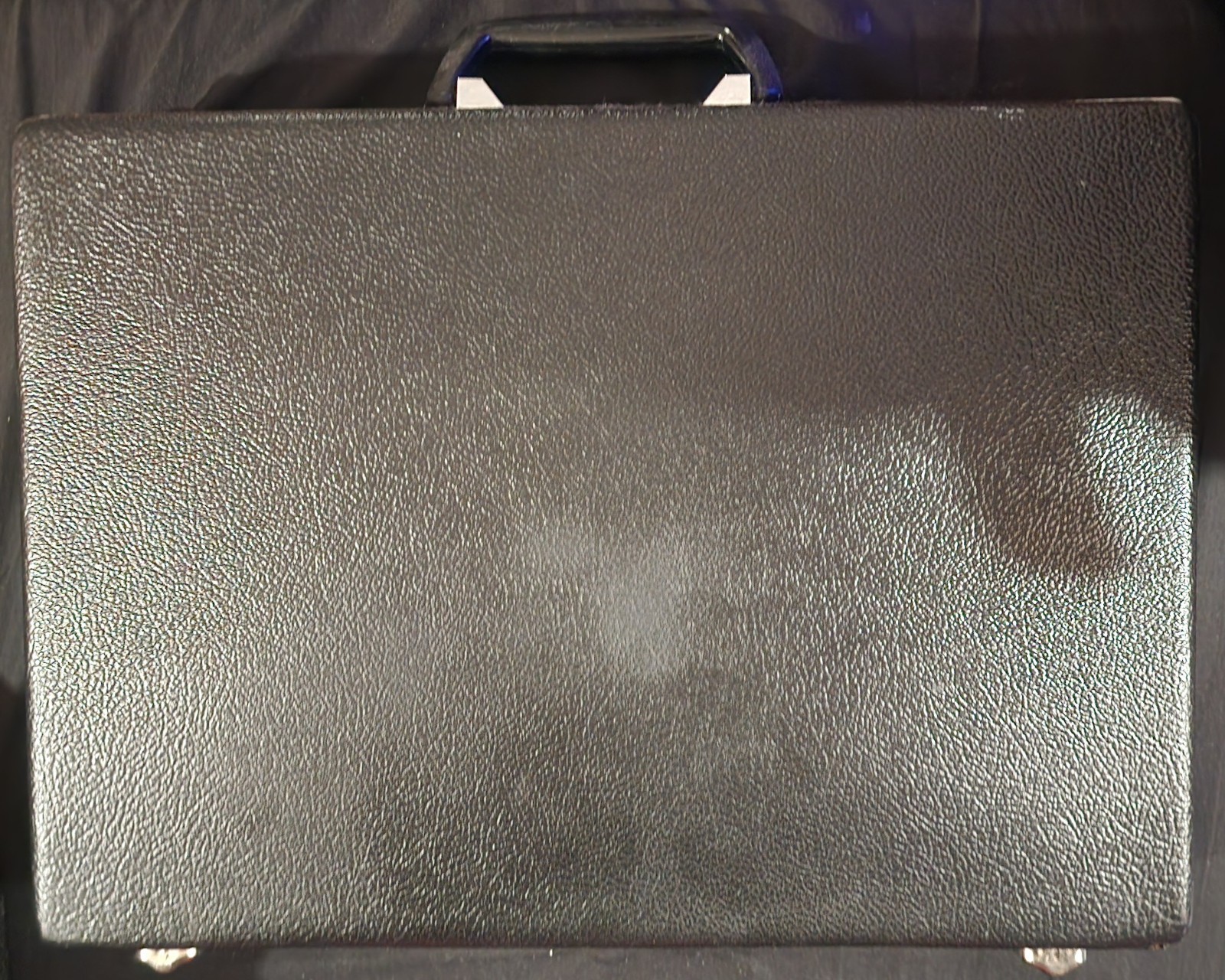 vintage black hard-shell briefcase