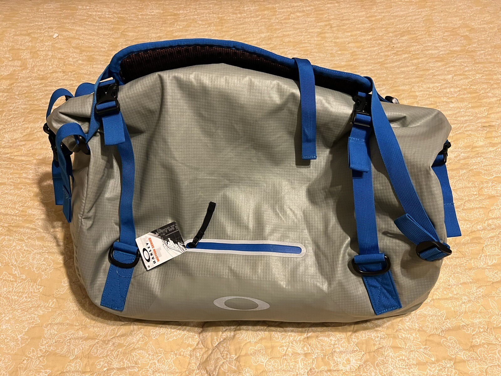 RARE Oakley Motion 42L Duffel Bag Carry Case Stainless Steel One Size Roll Top