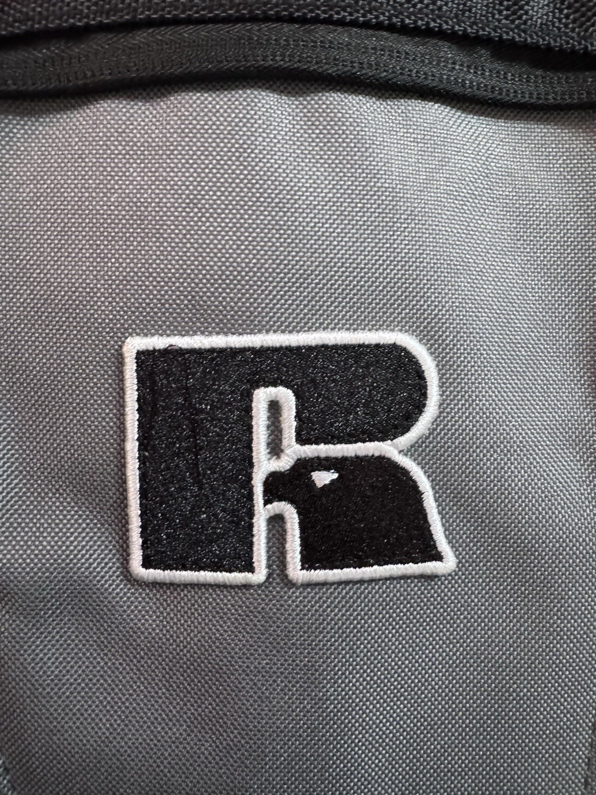 Russell Athletic Grey Backpack With Adjustable Straps & Side Pockets. Brand New