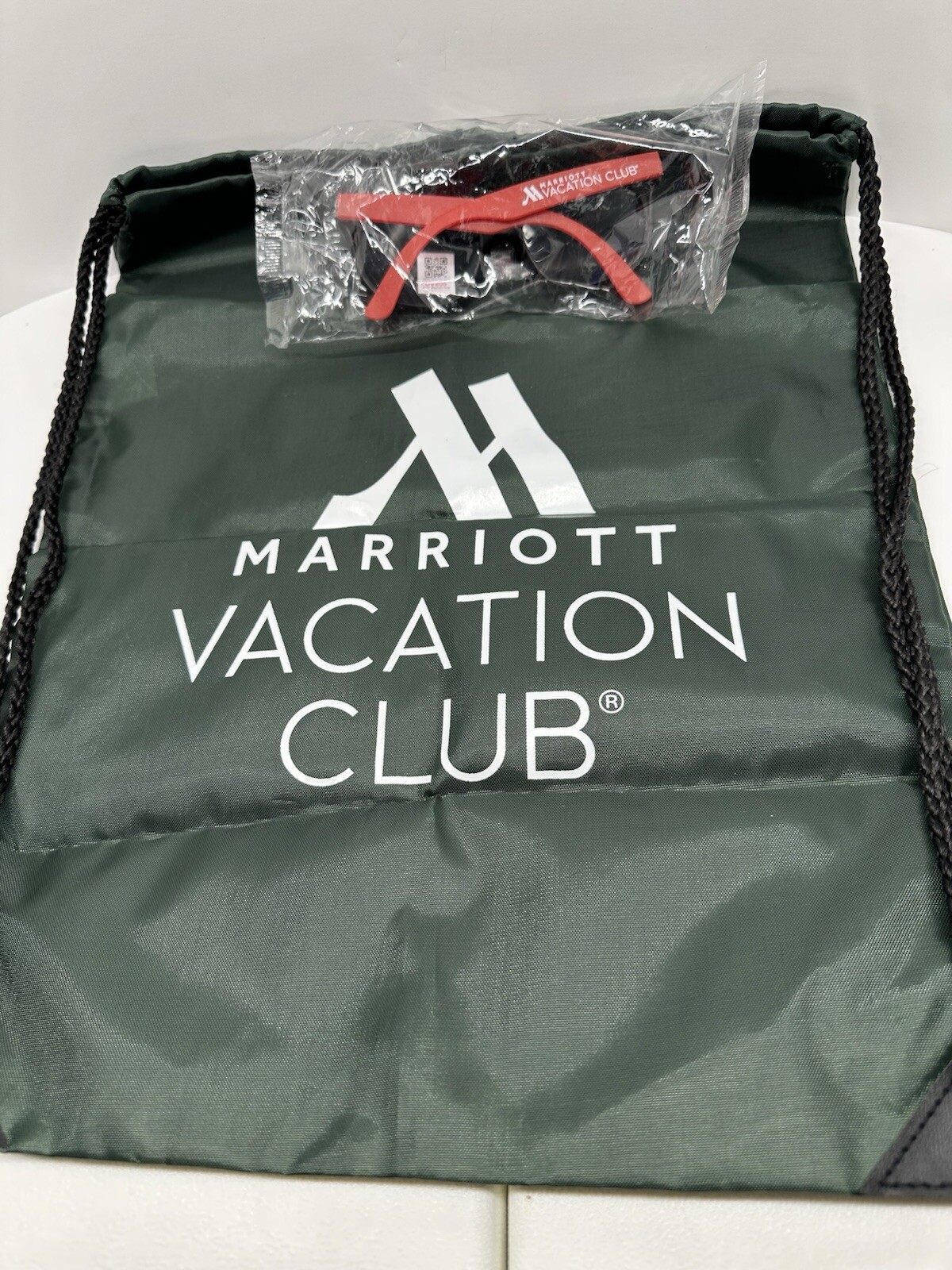 Marriott Vacation Club Swag Hunter Green String Backpack Red Plastic Sunglasses