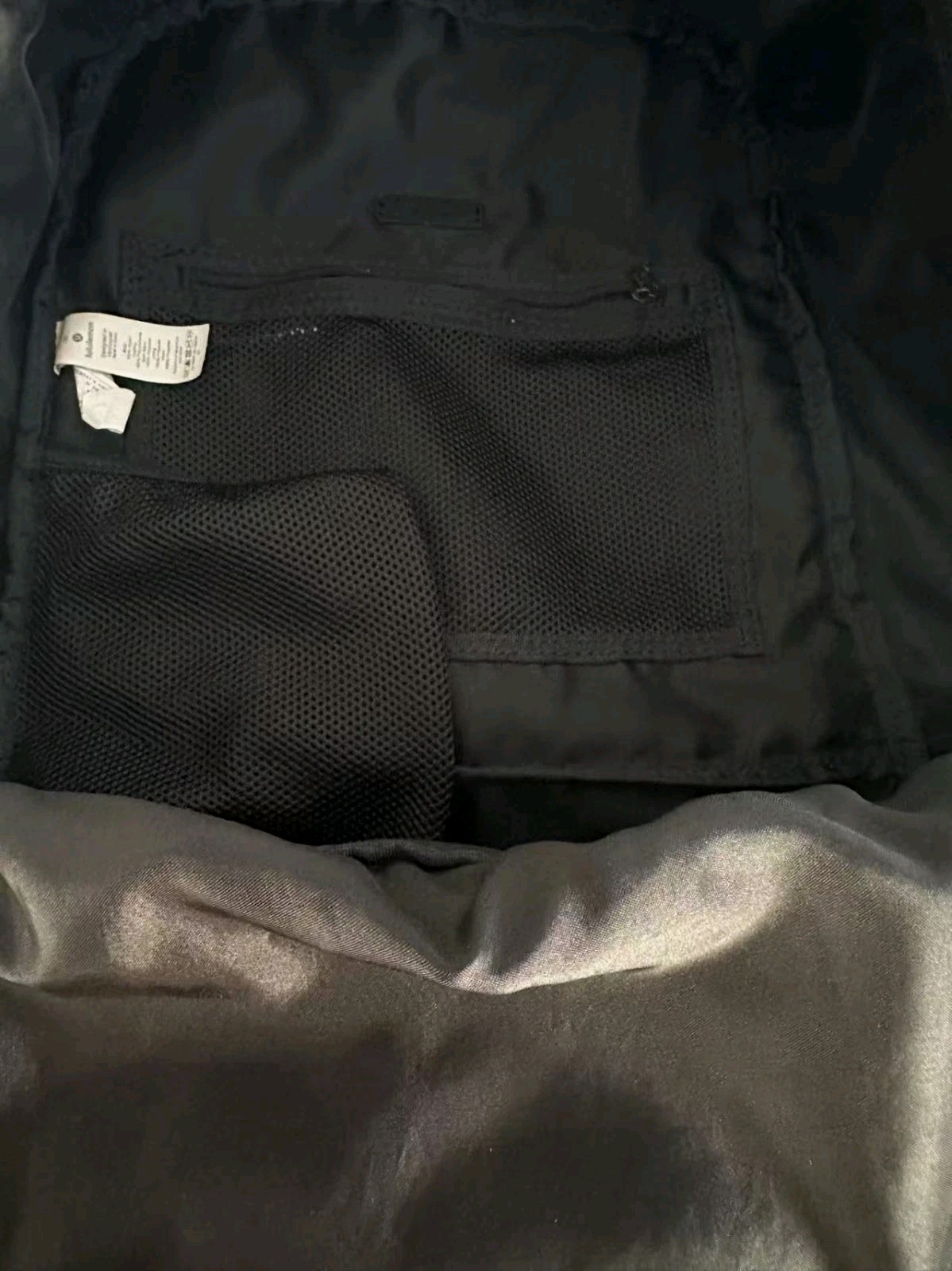 Black Lululemon City Adventurer backpack,iconic metal logo and waterproof fabric