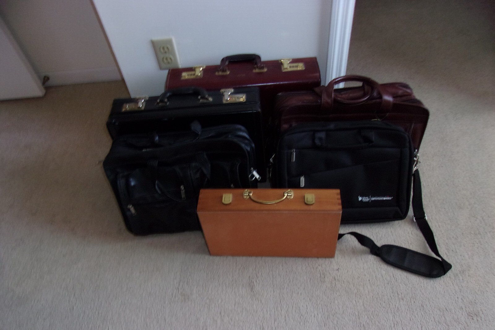 SIX BRIEF CASES. LEATHER AND WOOD. USED. (Selling as a group or individually).