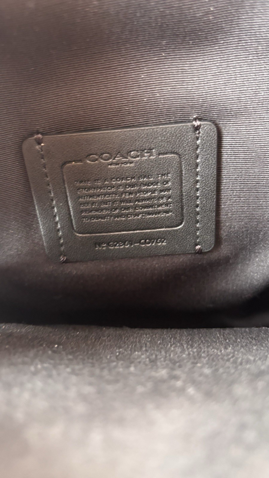 Coach Track Pack 14 in Metallic Ash.