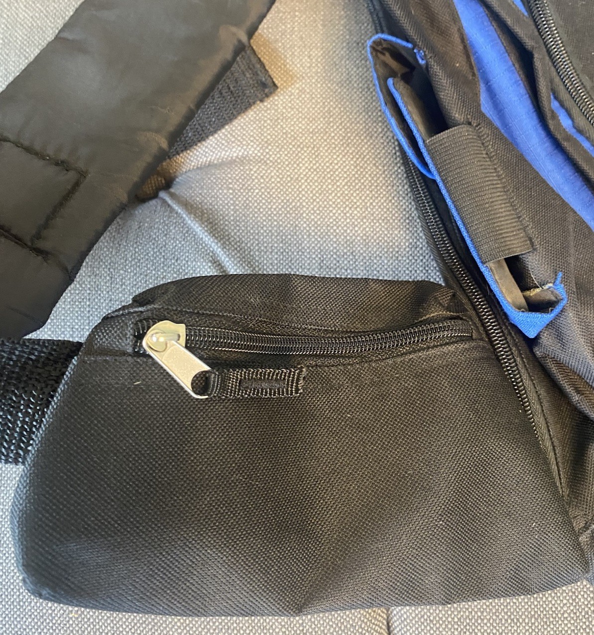 Blue And Black Sling Backpack With Logo Ahlstrom 4 Zip Bottle Misc. Pockets
