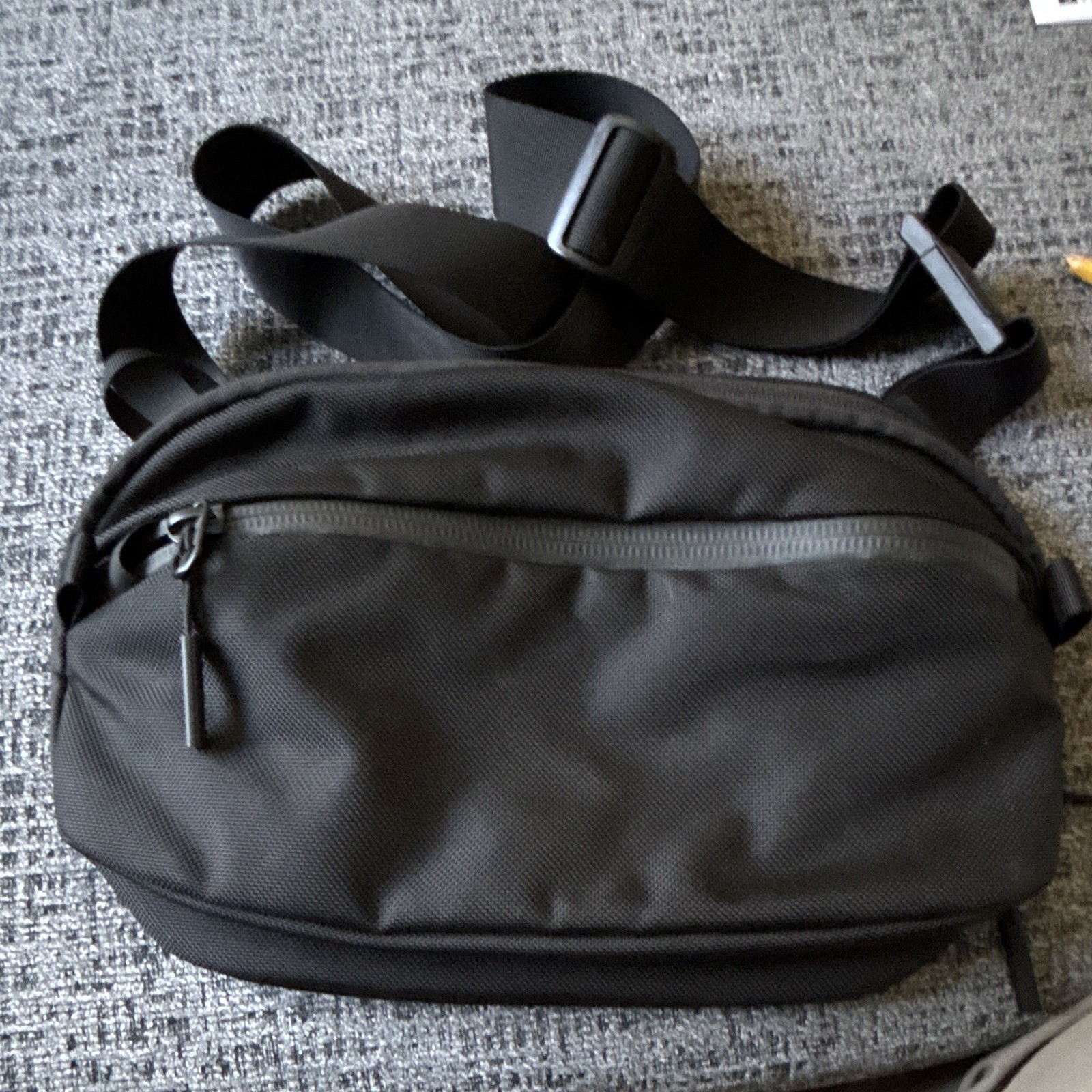 Aer Black Crossbody Sling Bag, Zip Closure, Adjustable Strap, Pockets