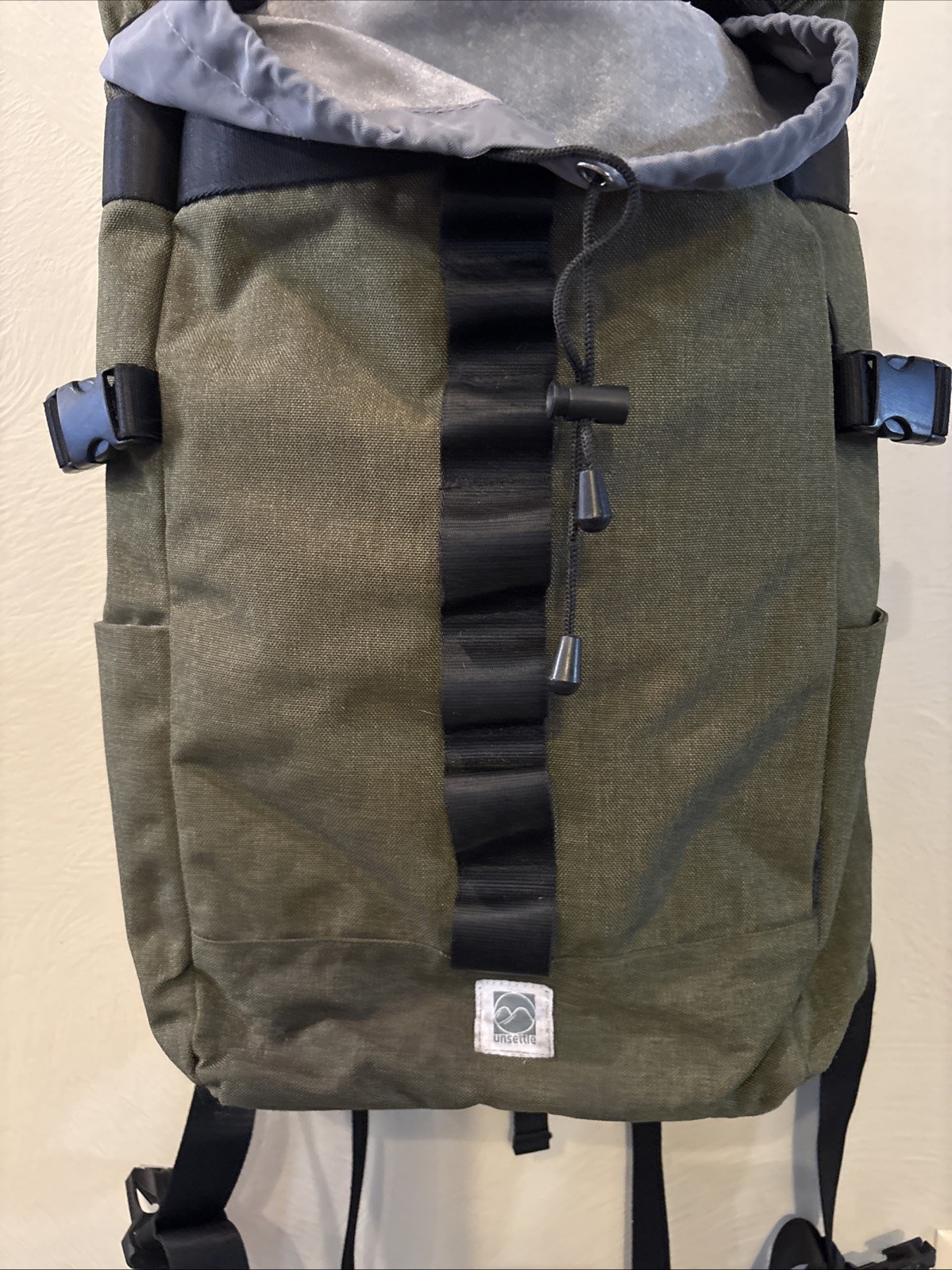 Unsettle Transit Rucksack Backpack – Field Green. Top Loader Many Pockets