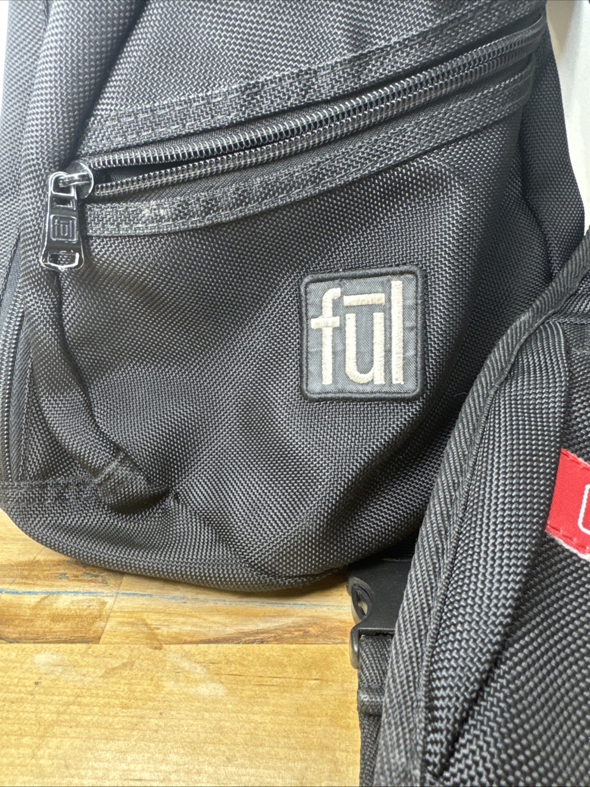 FUL One Shoulder Sling Backpack/Bag with adjustable strap in Black