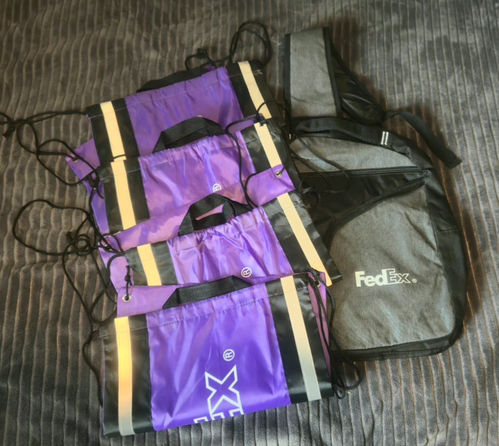 FedEx Sling Laptop Bag Gray/Black and 4 Purple Cinch Bags