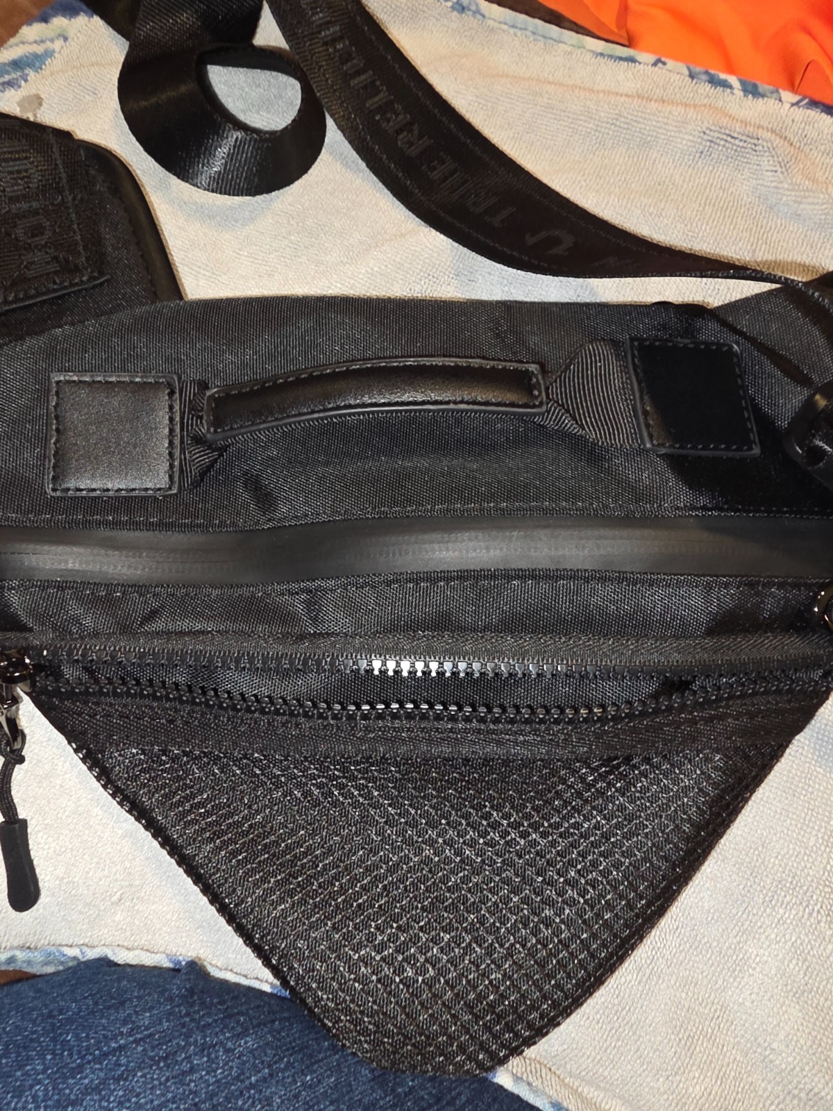 True Religion black Triangular Sling crossbody bag unisex. NWT