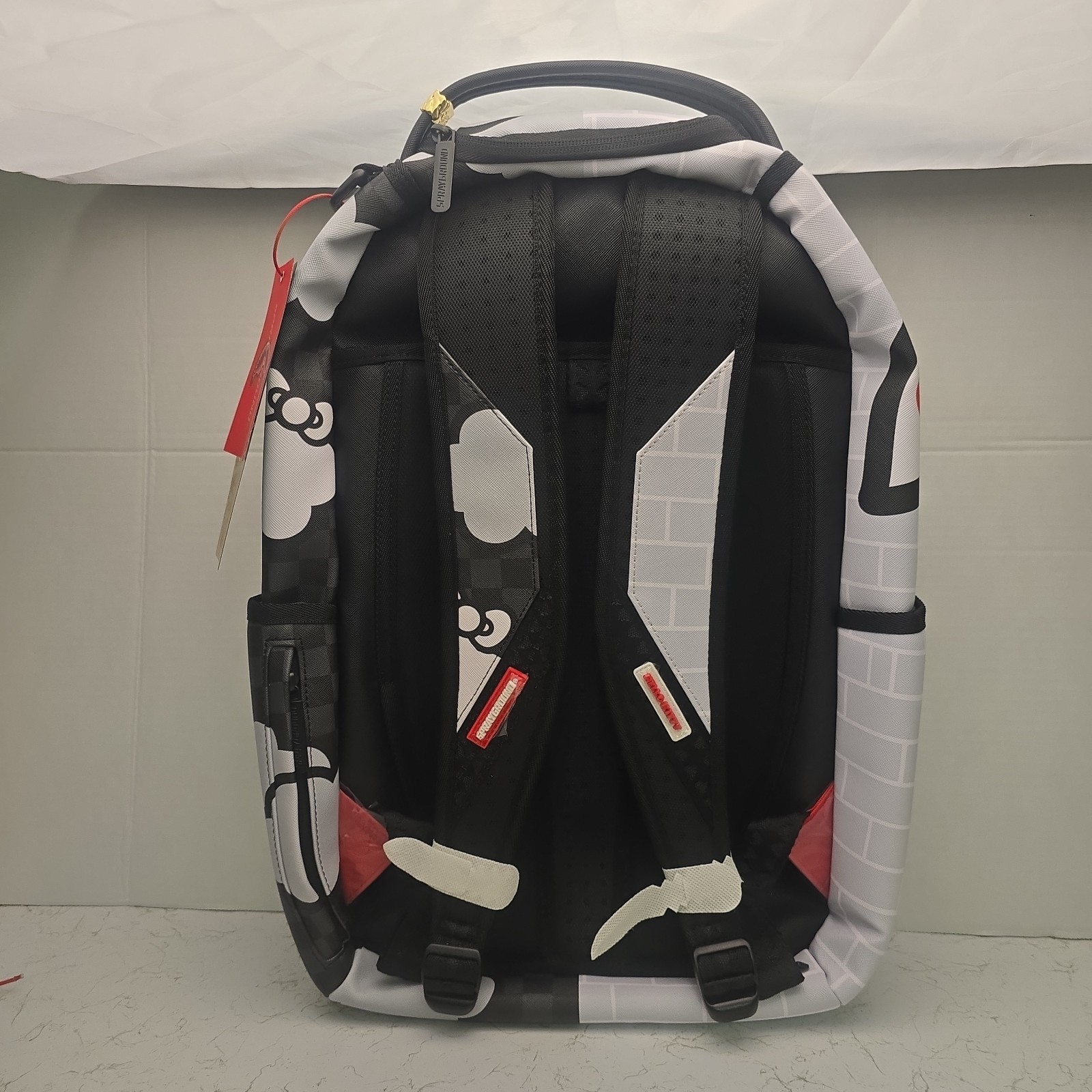 Sprayground – Hello Kitty Brick Wall Split Backpack Special Edition Colab.