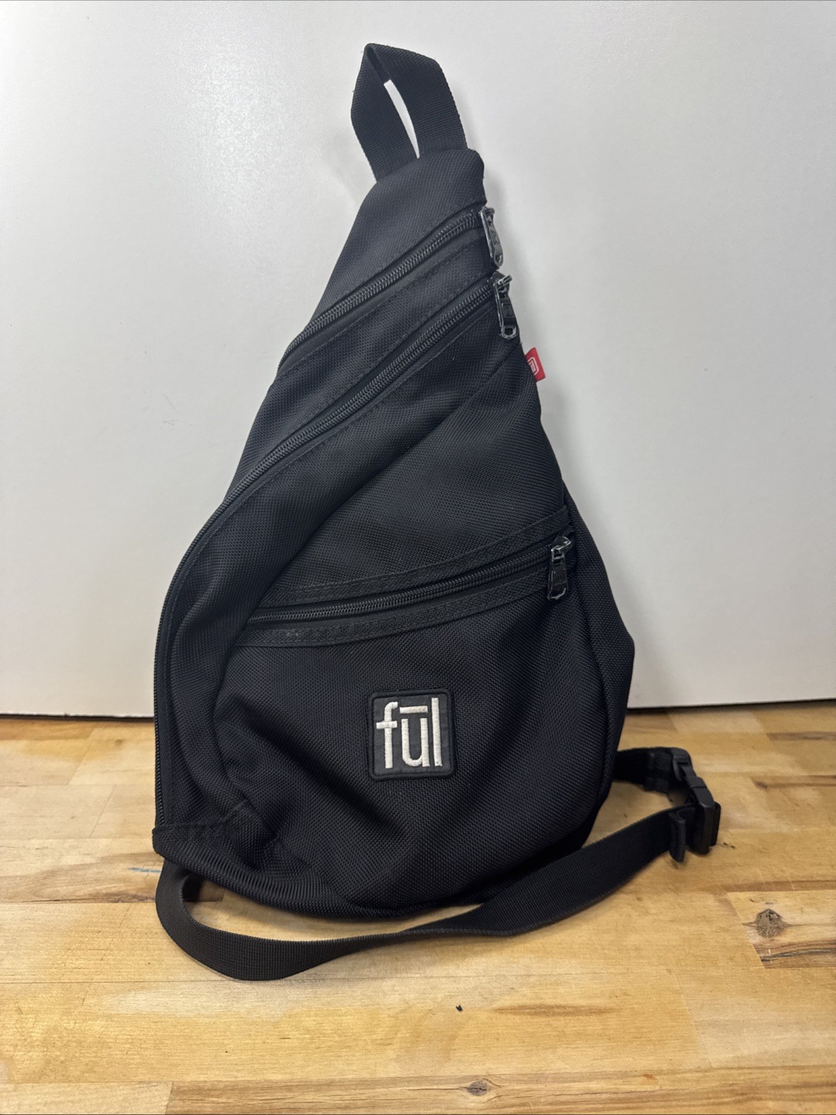 FUL One Shoulder Sling Backpack/Bag with adjustable strap in Black