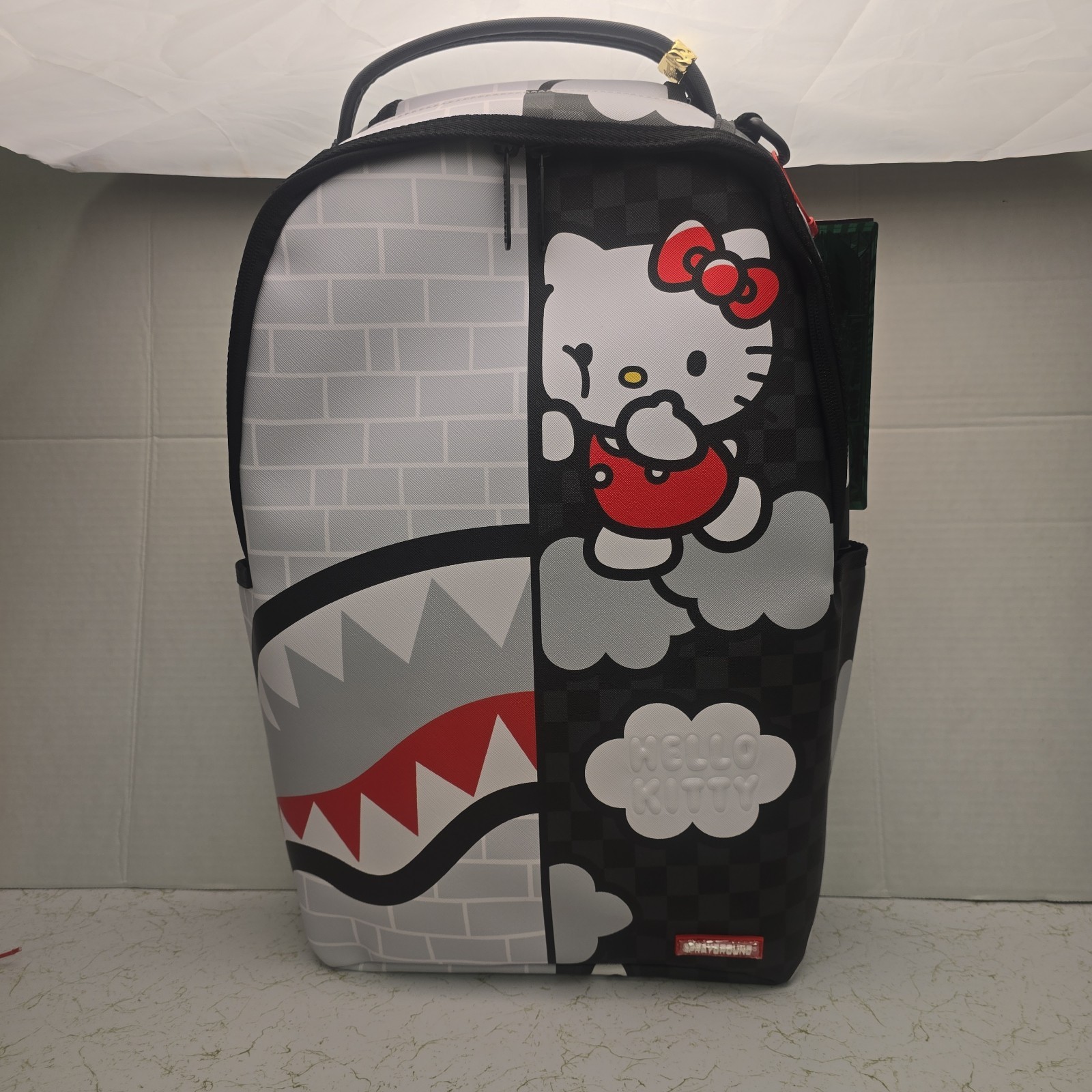 Sprayground – Hello Kitty Brick Wall Split Backpack Special Edition Colab.