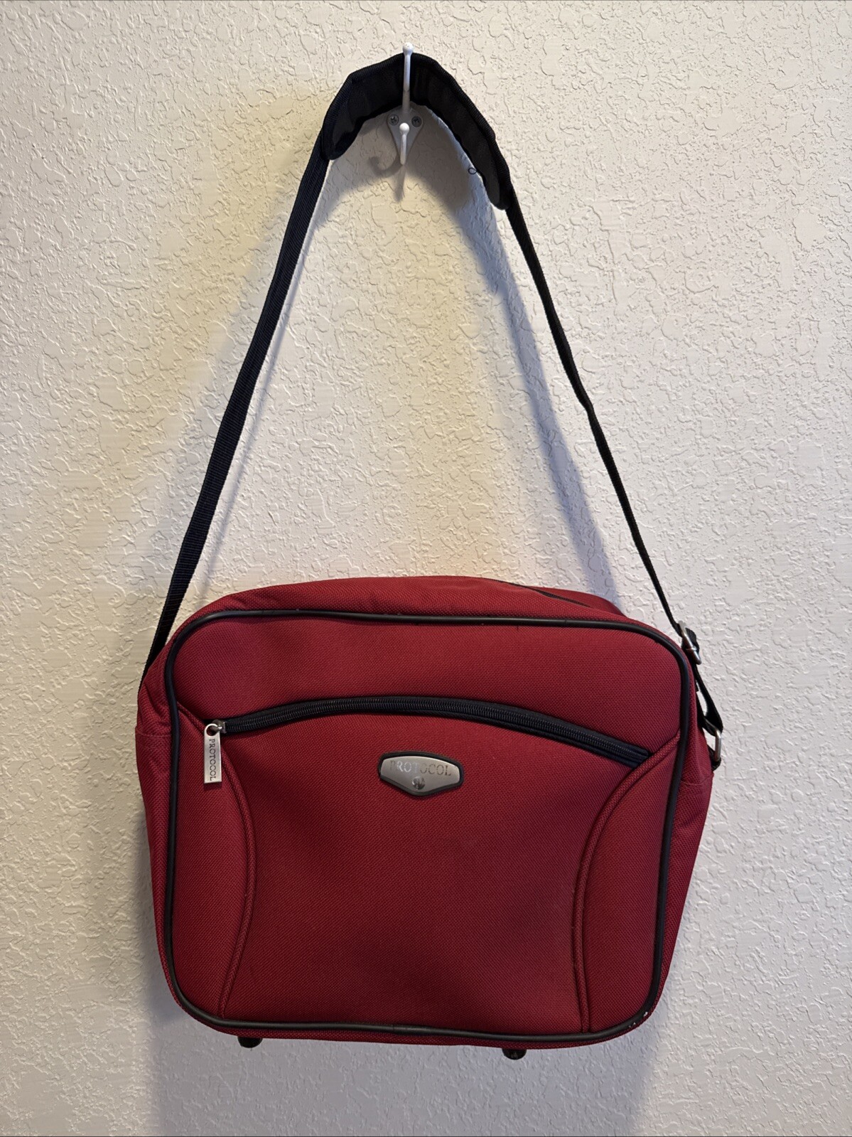 Protocol Messenger Bag Red 10in x 12in x 6in water resistant crossbody strap