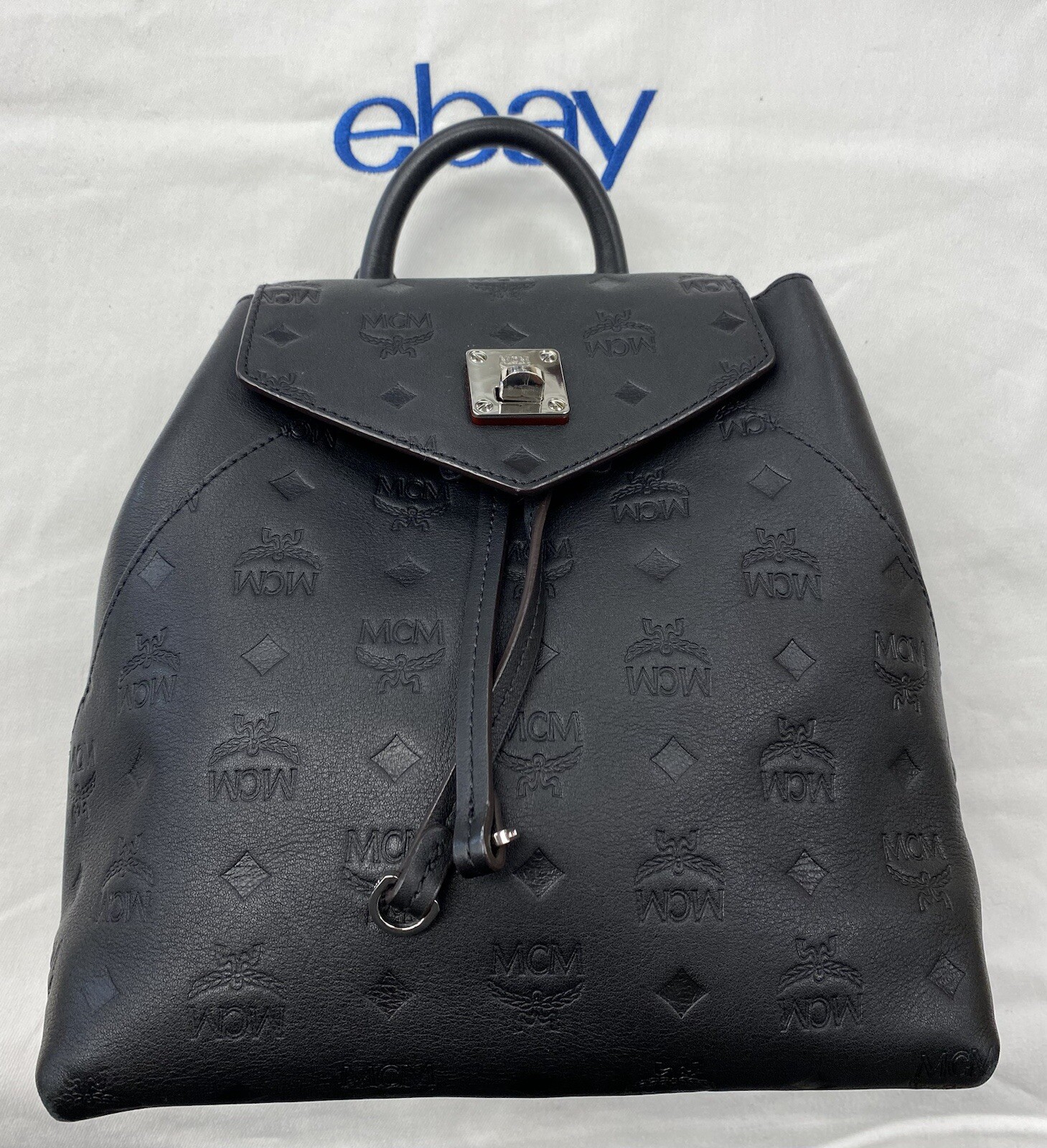 MCM Essential Monogram Leather Small Backpack In Charcoal 10×8.5×4.5 Dark Brown