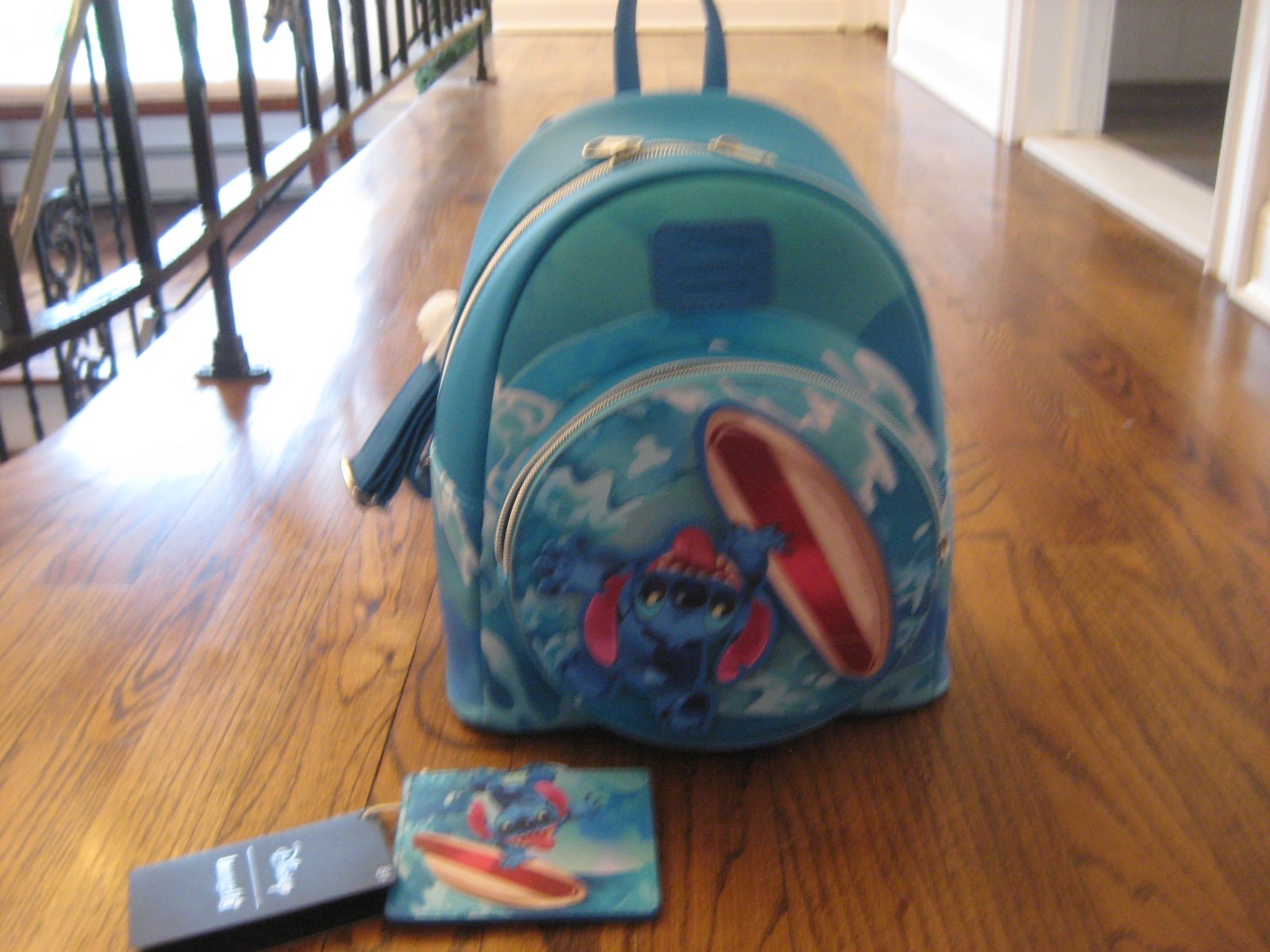Loungefly Disney Lilo and Stitch Spinning Stitch Surfer Mini Backpack/Card Hold