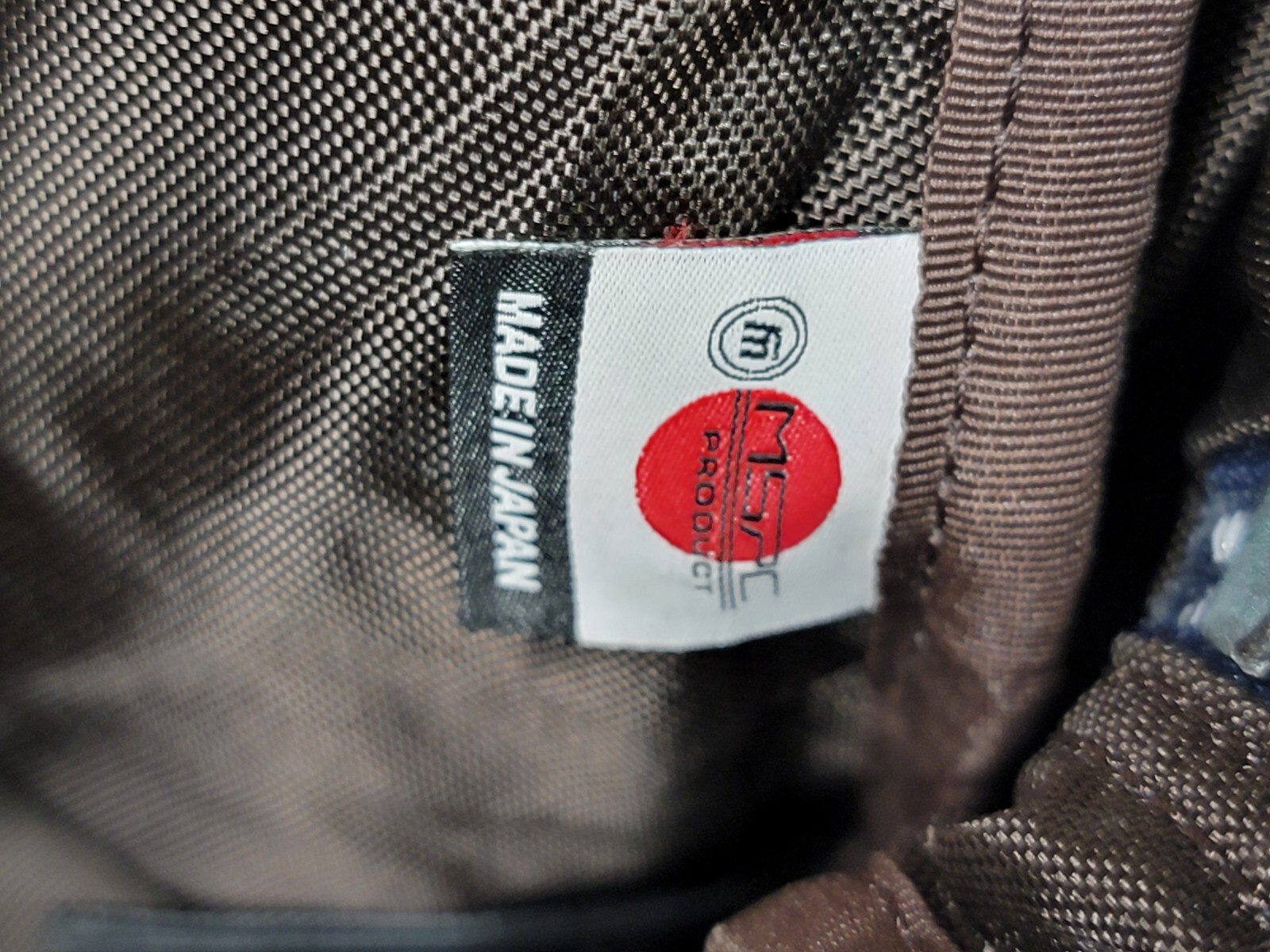 Master-Piece Backpack – Made in Japan Navy & Tan Leather.
