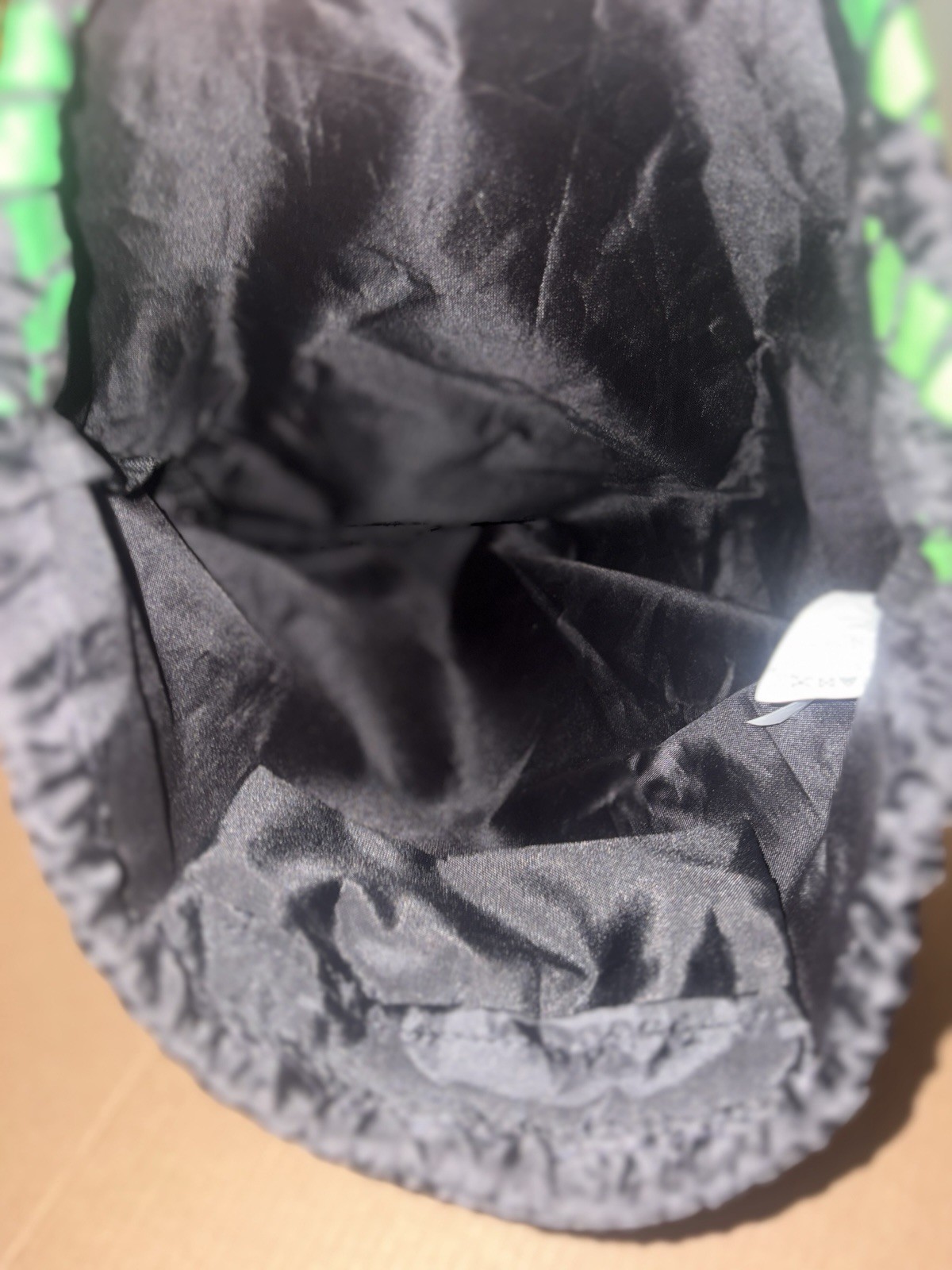 DC skate brand Simpski drawstring green with black and white dc logo backpack